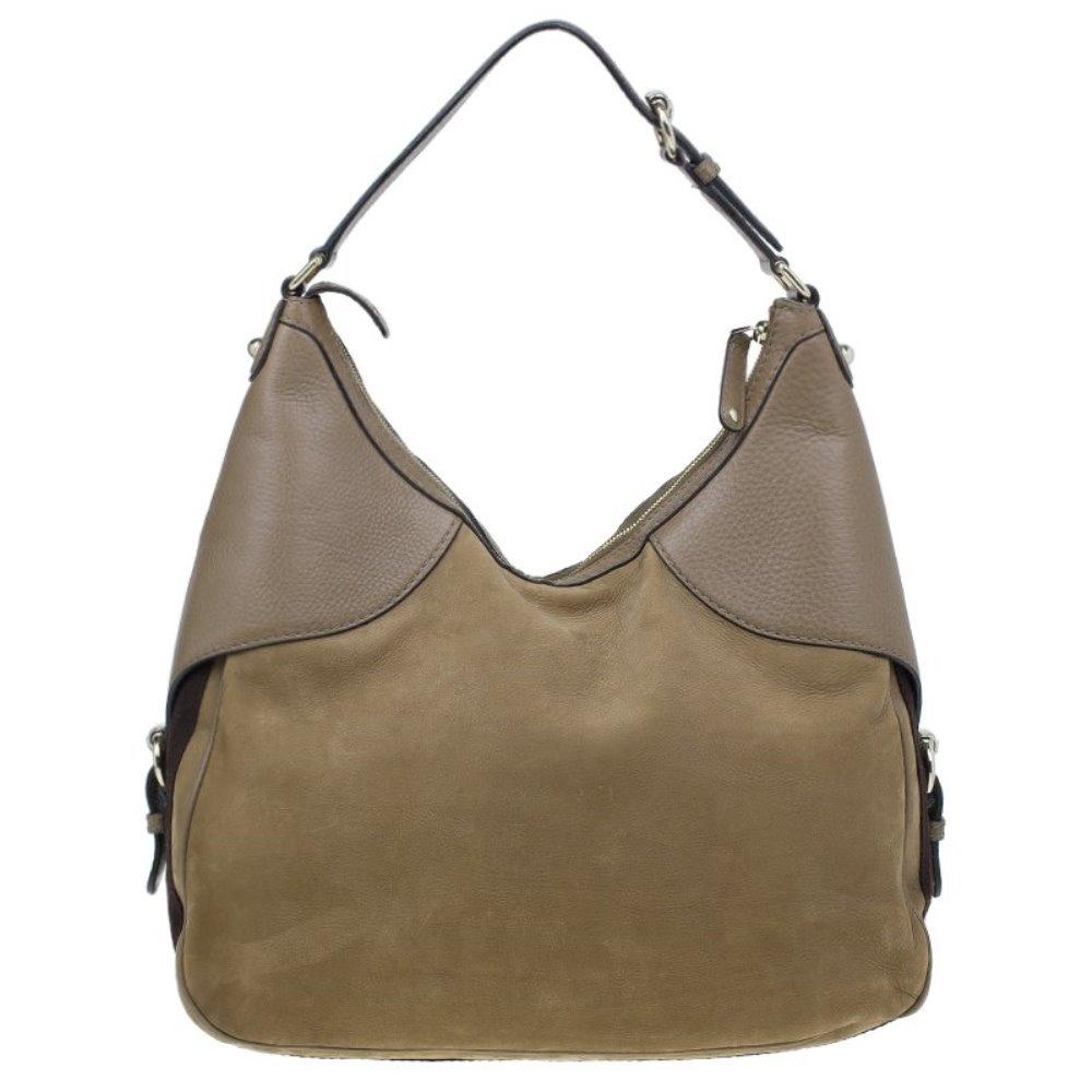 On the hunt for a gorgeous new carryall? This brown leather Gucci hobo is your answer. Crafted in suede, it features leather details and a gold-tone horsebit accent at front. The top leather handle is adjustable and the bag comes surrounded with