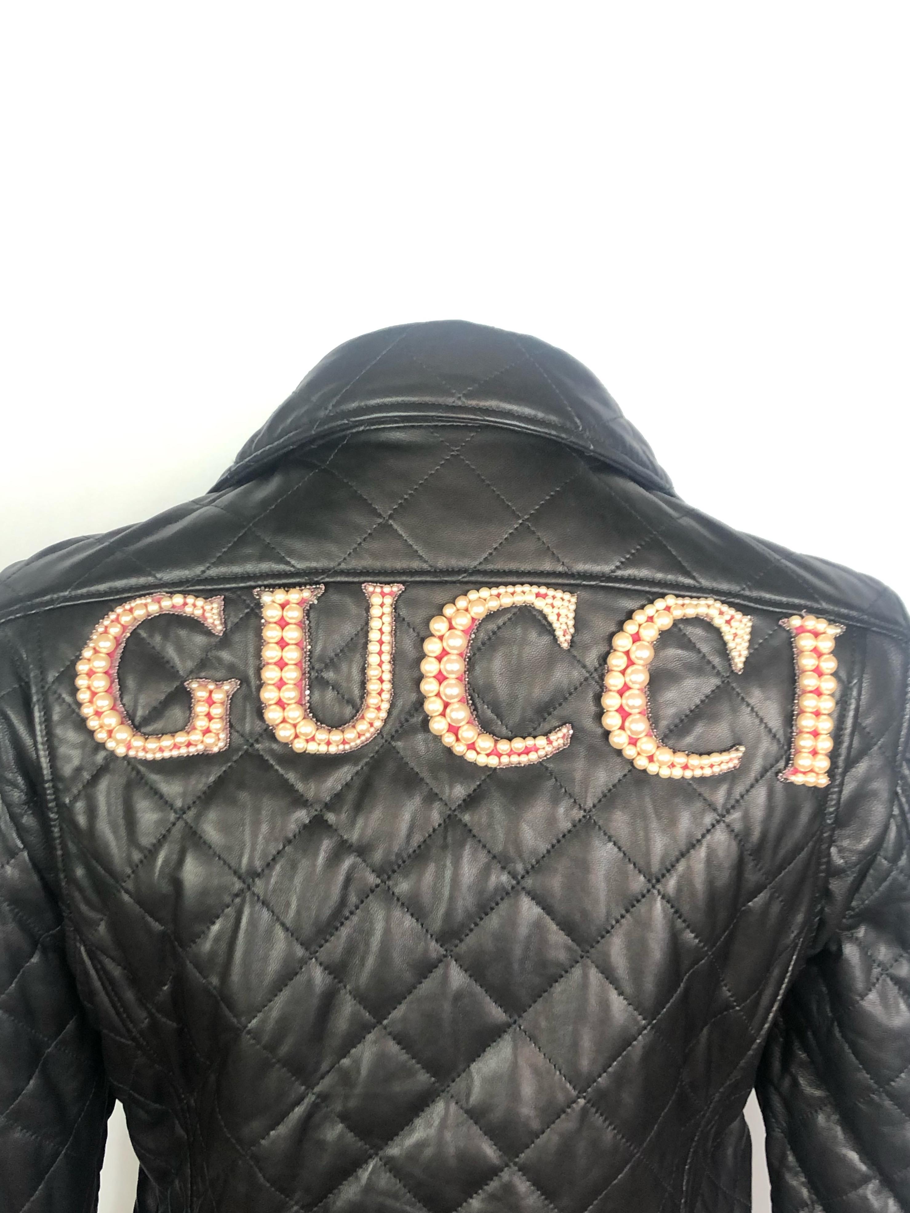 GUCCI Brown Leather Moto Jacket w/ Pearls Size 44

Product details:
Size is 44
Shoulder to shoulder measures 16.5”
Brown stitched leather jacket 
featuring silver-tone metal detail, all stamped with GUCCI sign
Double buckles on each side 
Zipper