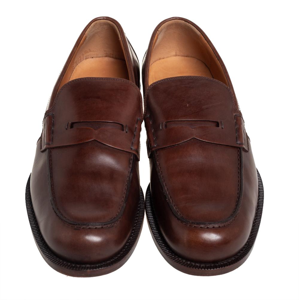 When comfort means luxury, we get these Gucci loafers! Crafted from leather in a brown shade, they are augmented with penny keeper straps on the uppers. Comfortable insoles, neat stitches, and pulls made accented with Web stripes.

