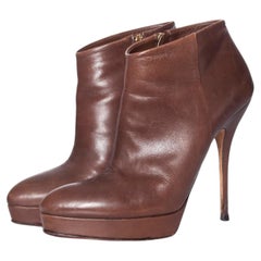 Gucci, Brown leather platform ankle boots.