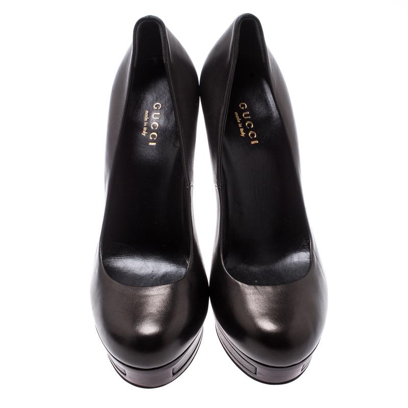 Treat your feet by choosing these stunning pumps from Gucci! The pumps come crafted from brown leather and shaped as round toes. Platforms and 12.5 cm sturdy heels complete this pair!

Includes: Original Dustbag

The Luxury Closet is an elite luxury