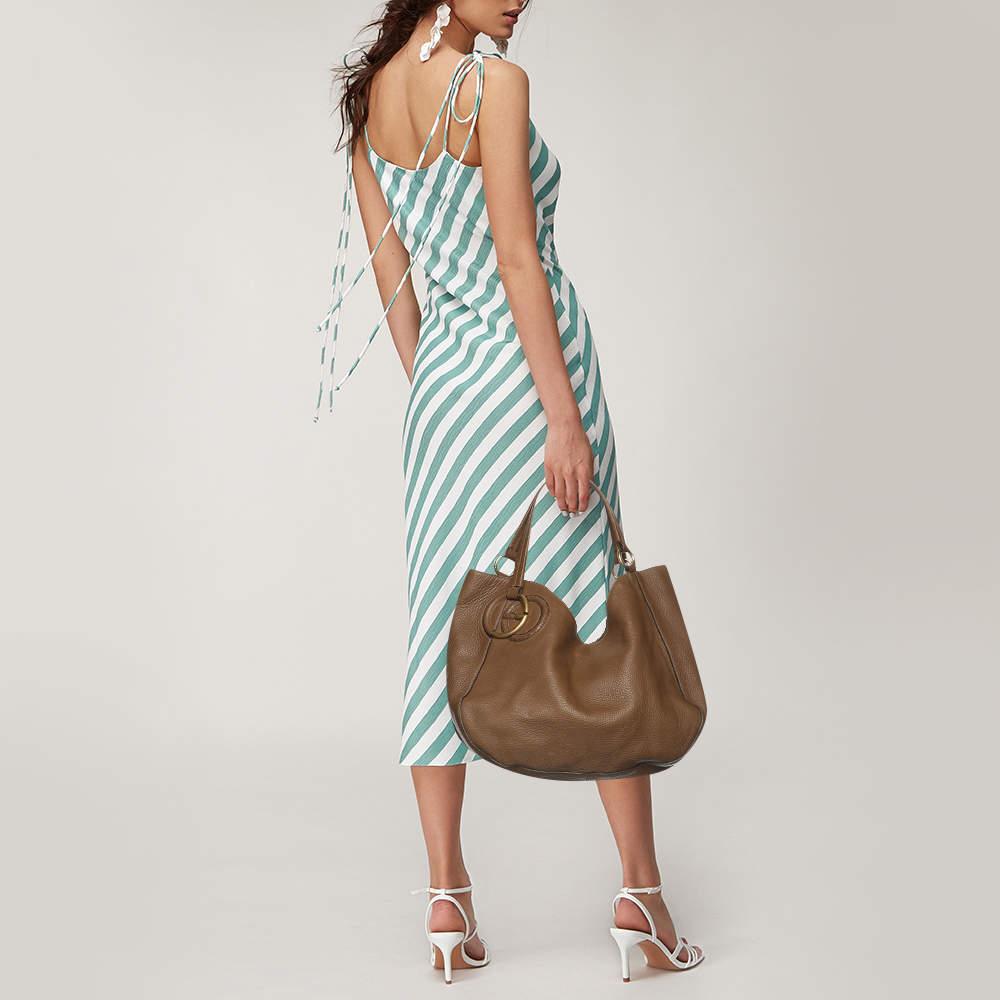 This alluring tote bag for women has been designed to assist you on any day. Convenient to carry and fashionably designed  the tote is cut with skill and sewn into a great shape. It is well equipped to be a reliable accessory.