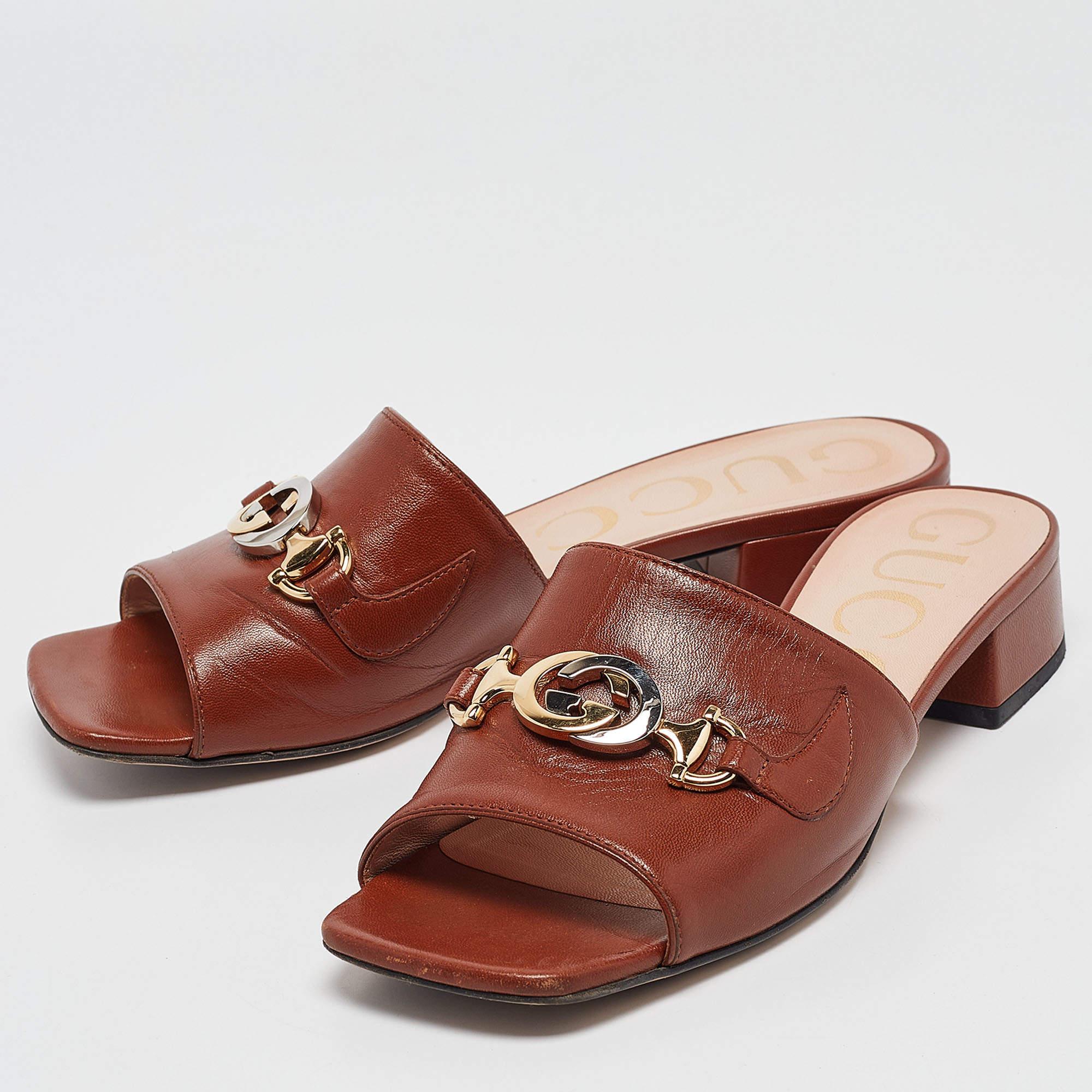 The Zumi line from Gucci is named after the modern and unconventional actress and musician Zumi Rosow. This line merges two distinctive signatures  the interlocking G logo  and the Horsebit together to deliver a signature look that is chic and