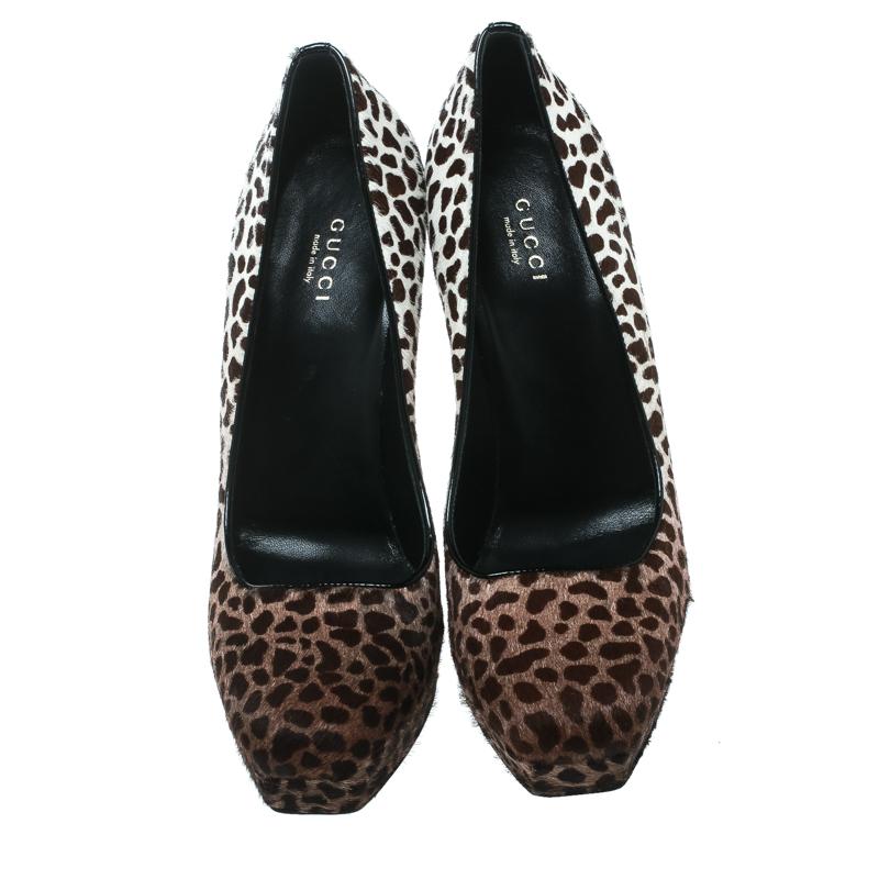 Ace the contemporary look and make a style statement like never before in these fabulous pumps from Gucci! The brown pumps have been crafted from pony hair and leather trims and styled with square toes. They feature a leopard print all over the