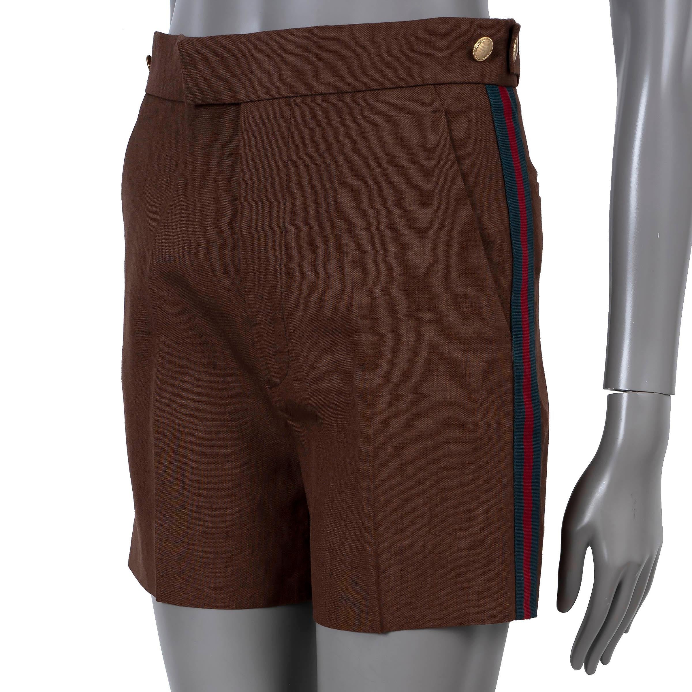 100% authentic Gucci tailored shorts in brown viscose (86%) and linen (14%) - please note the content tag is missing. Feature a high-waist with adjustable buttoned straps, web side stripes in green and red, two slant pockets at the waist and two