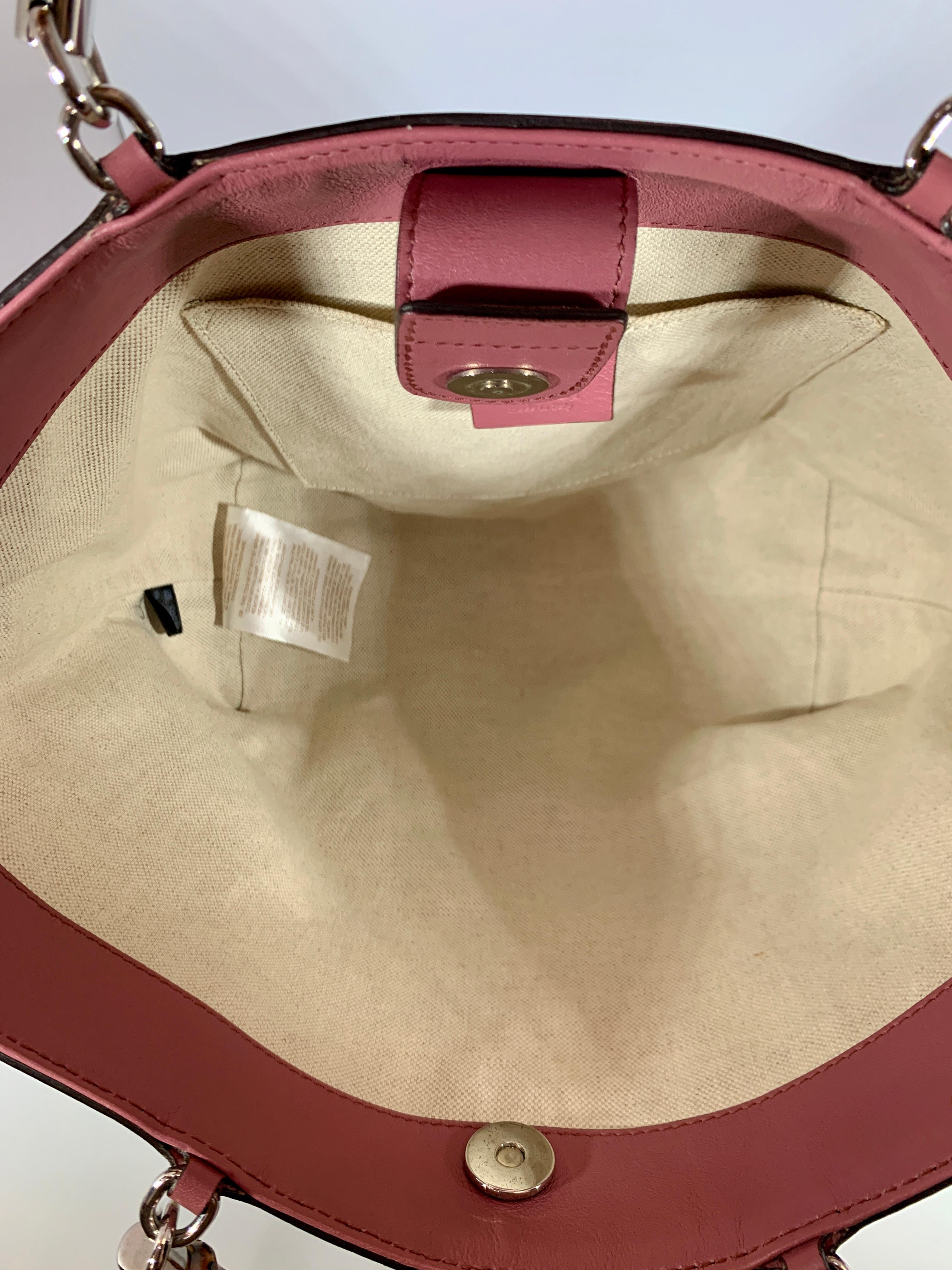 Gucci Brown Medium Pink Canvas GG  Guccissima Bamboo Tote Handbag Purse Kids 
Authenticity Guaranteed 
Details
Brand: Gucci Lids Line
Condition: Excellent like new , hardly used , no sign of use
Color Beige And Brown and Pink
Magnetic button flap