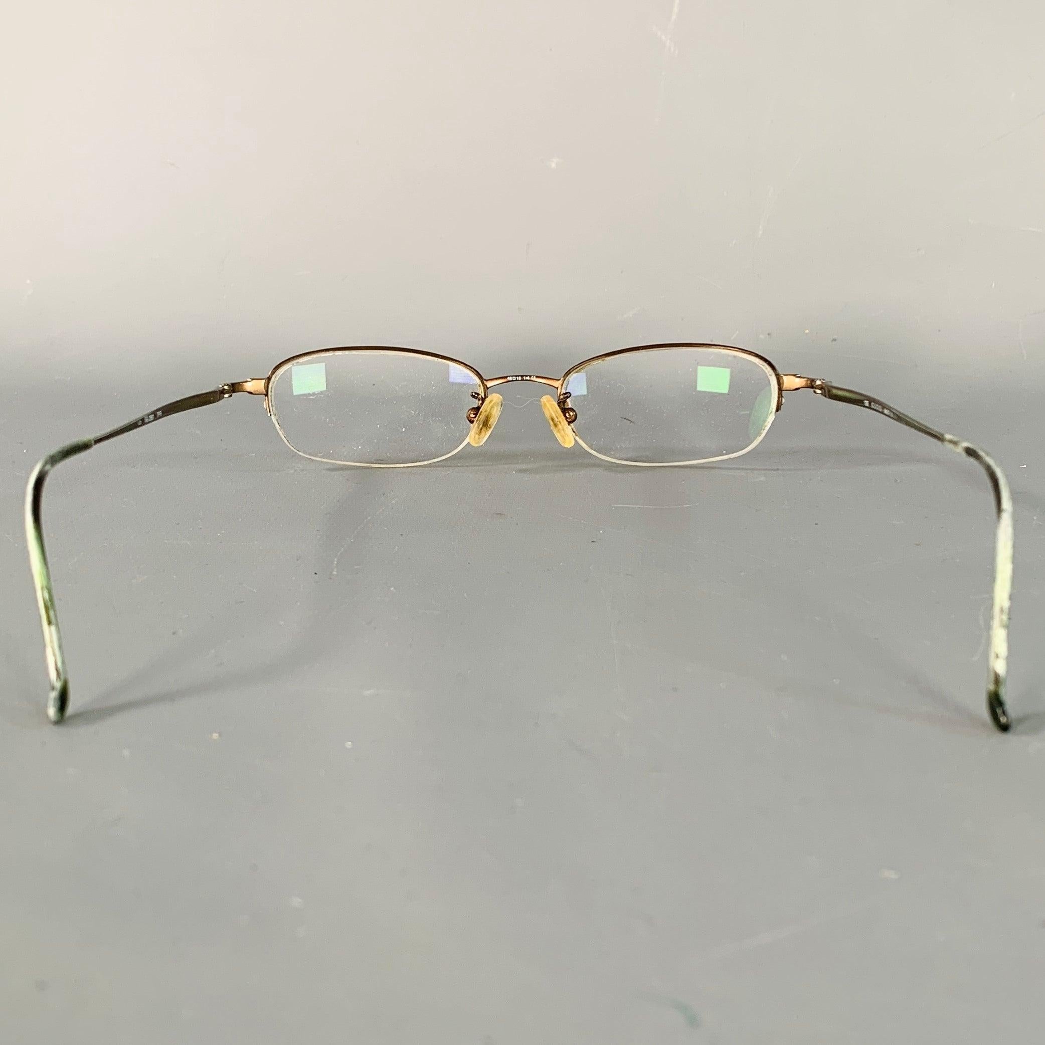 Grigio Occhiali da vista senza montatura in metallo marrone Gucci in vendita