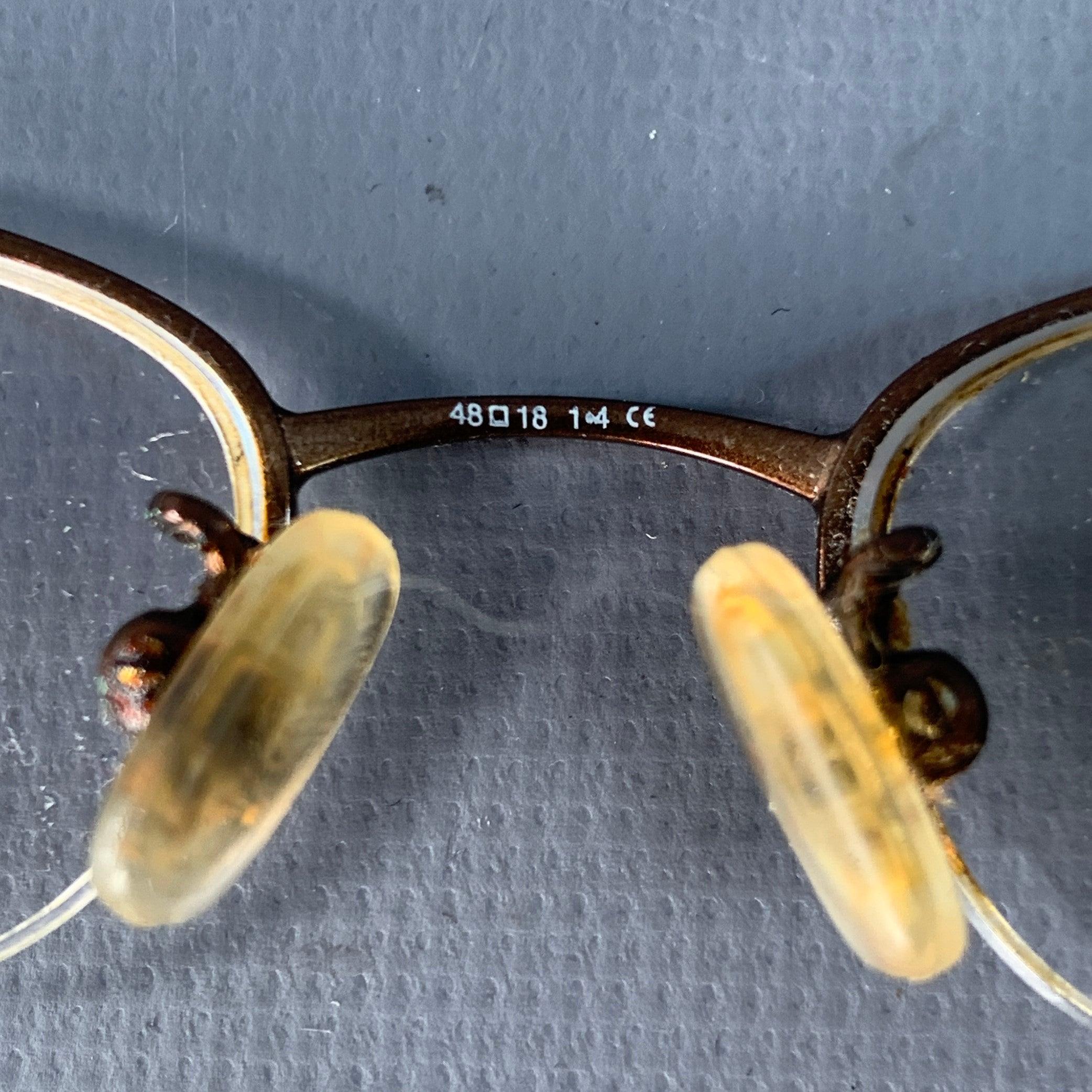 Occhiali da vista senza montatura in metallo marrone Gucci in vendita 2