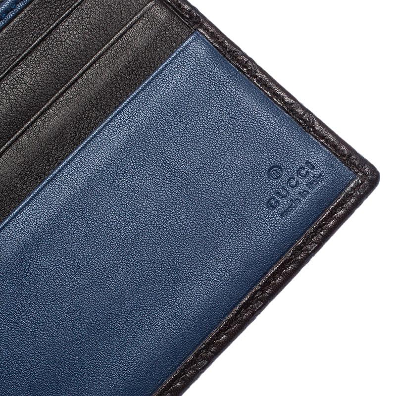 This wallet from Gucci brings along durability and functional style. It comes crafted from Microguccissima leather and detailed with a GG stud. It is equipped with multiple slots and compartments just so you can neatly carry your cards and