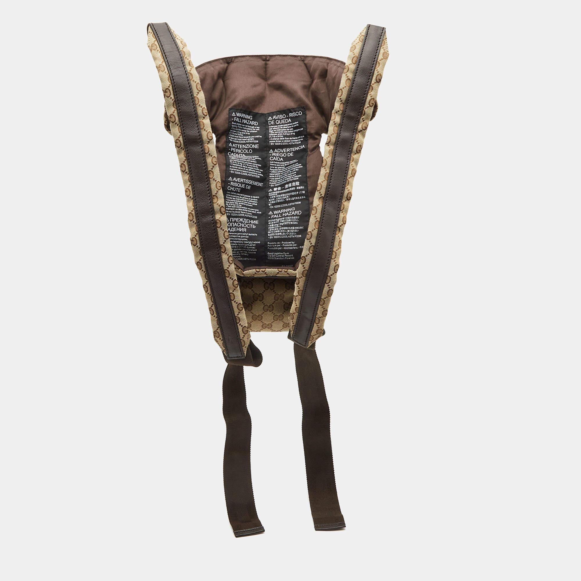 Carefully sewn using GG canvas and leather, this baby carrier from Gucci is made in Italy. It is a durable, light, and comfortable creation.

Includes: Original Dustbag

