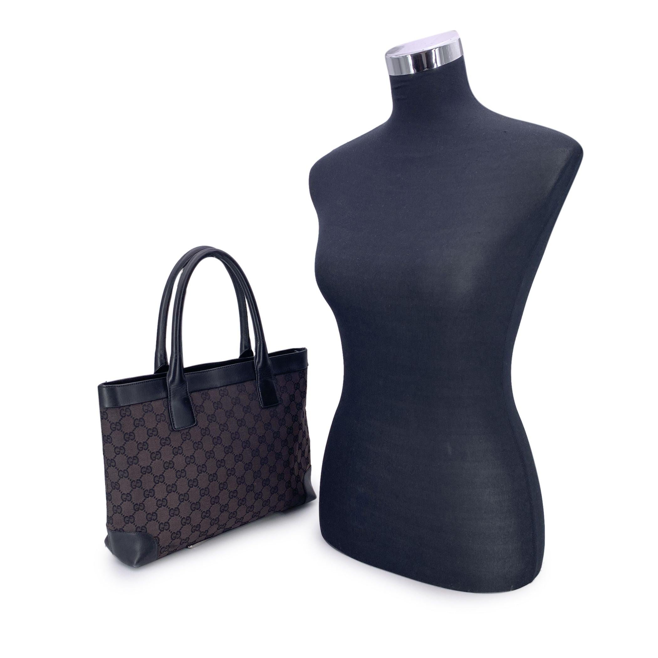 Gucci Monogram Canvas Tote - A Classic with Quiet Confidence Sleek, subtle, and unmistakably Gucci - this dark brown monogram canvas tote is a minimalist essential with vintage soul. The signature GG canvas in dark brown creates a timeless
