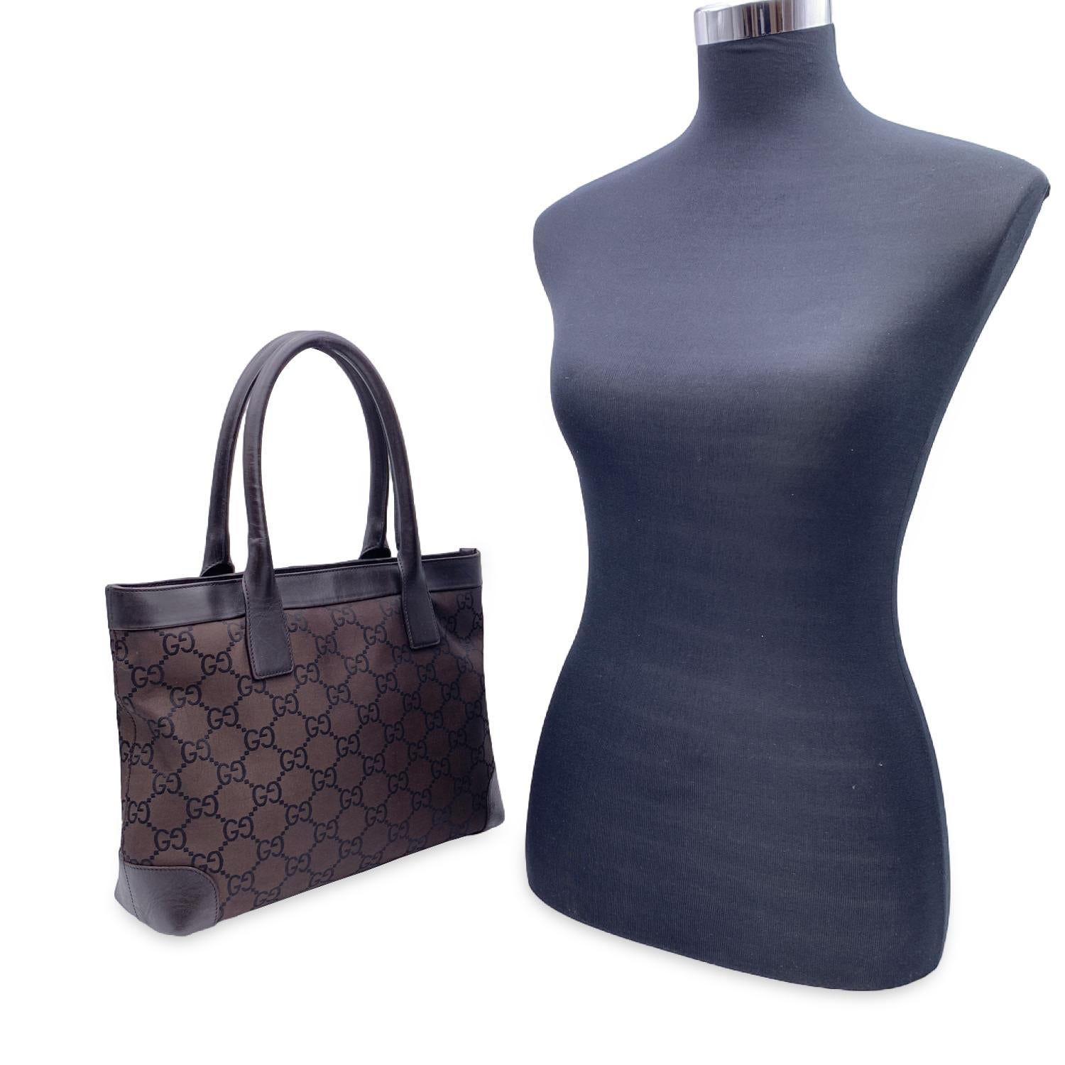 Beautiful Gucci monogram Tote bag, crafted in brown GG - GUCCI monogram canvas with brown leather trim and handles.Upper zipper closure. Fabric lining. 1 side zip pocket. 'GUCCI - made in italy' tag inside (with serial number on its