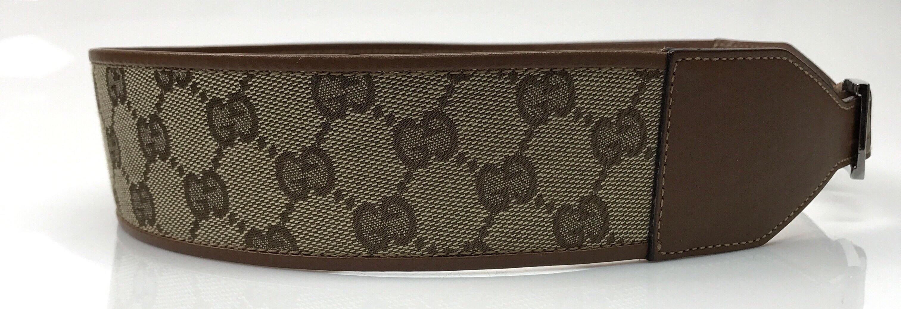 Gucci Brown Monogram Thick Waist Belt. This amazing Gucci belt is in excellent condition. There is no visible sign of use. The belt is made of brown leather and have a monogrammed design. It is a thick waist belt with a silver buckle. This belt has
