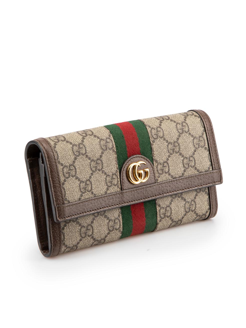 CONDITION is Very good. Minimal wear to wallet is evident. Minimal tarnishing to GG hardware and small pen mark on interior leather flap on this used Gucci designer resale item. Original dust bag and box included.

Details
Ophidia model
Brown
Coated