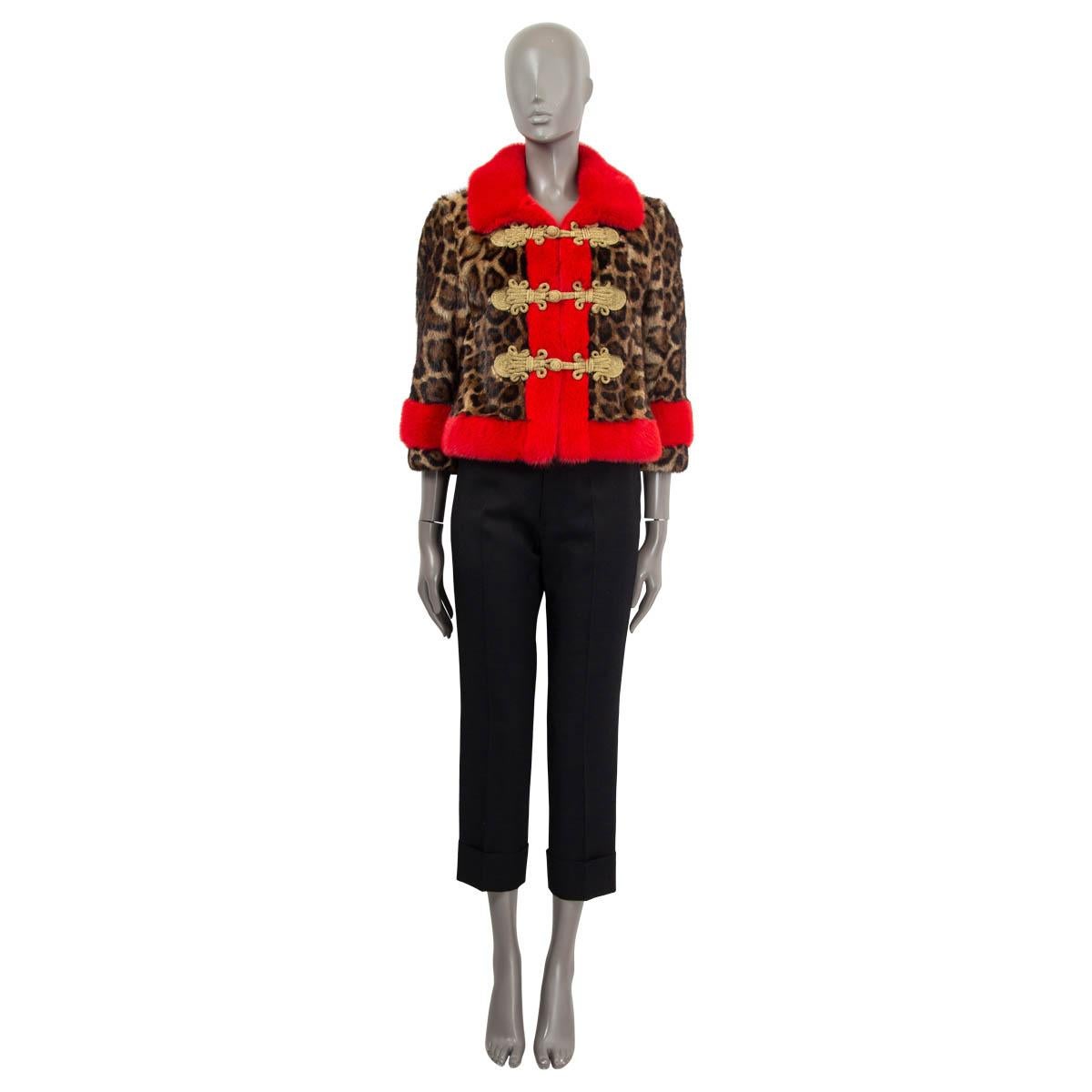 100% authentic Gucci Resort 2017 hussar military jacket in red, brown and camel bobak marmot and mink fur (100%). Open with gold braided buttons on the front. Lined in purple silk (100%) and has two embroidered double headed gazelles on the inside.