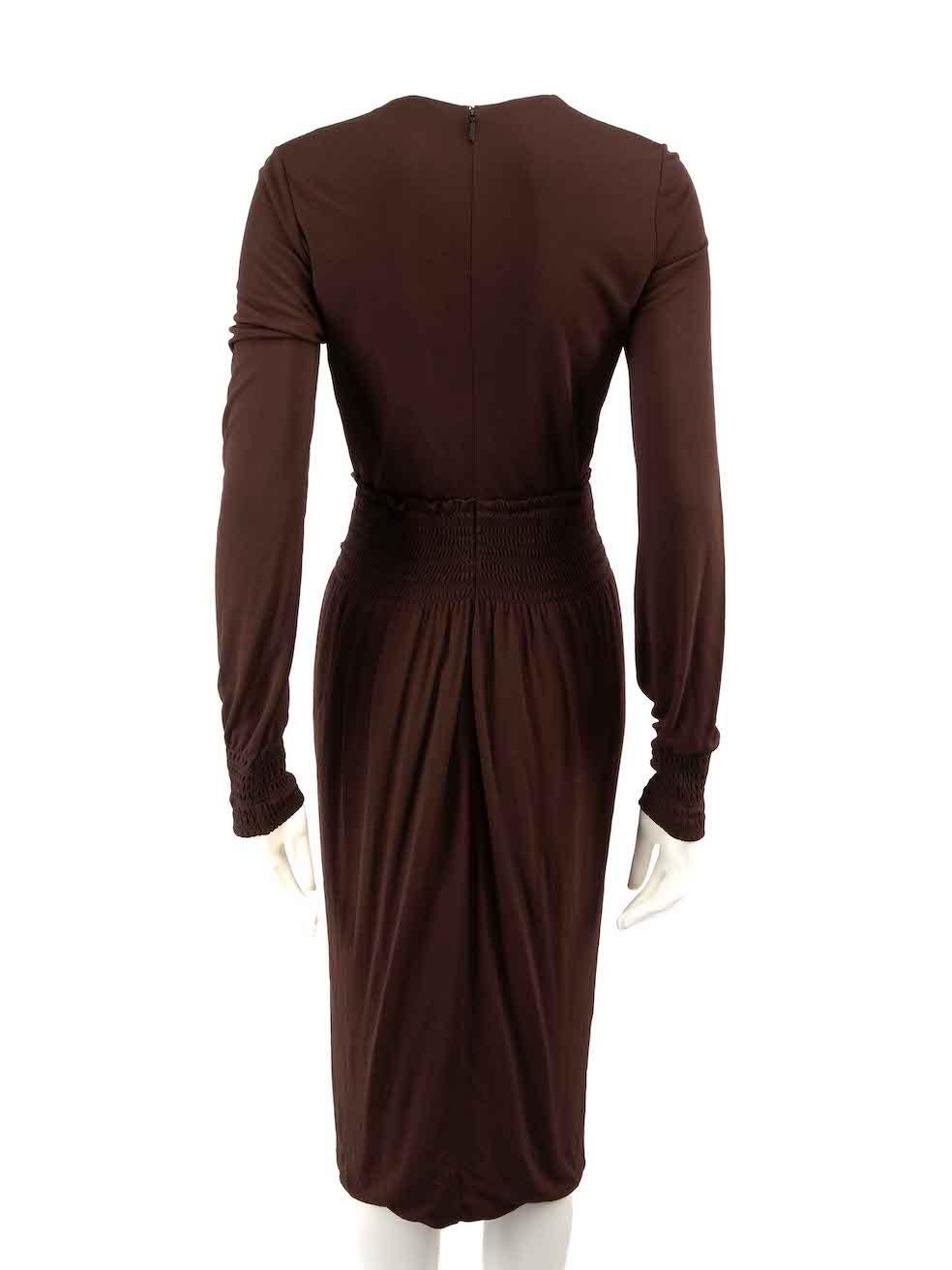CONDIT ist sehr gut. Kaum sichtbare Abnutzungserscheinungen am Kleid sind bei diesem gebrauchten Gucci Designer-Wiederverkaufsartikel zu erkennen.
 
 
 
 Einzelheiten
 
 
 Braun
 
 Viskose
 
 Midikleid
 
 Elastischer Bund
 
 V-Ausschnitt
 
 Lange