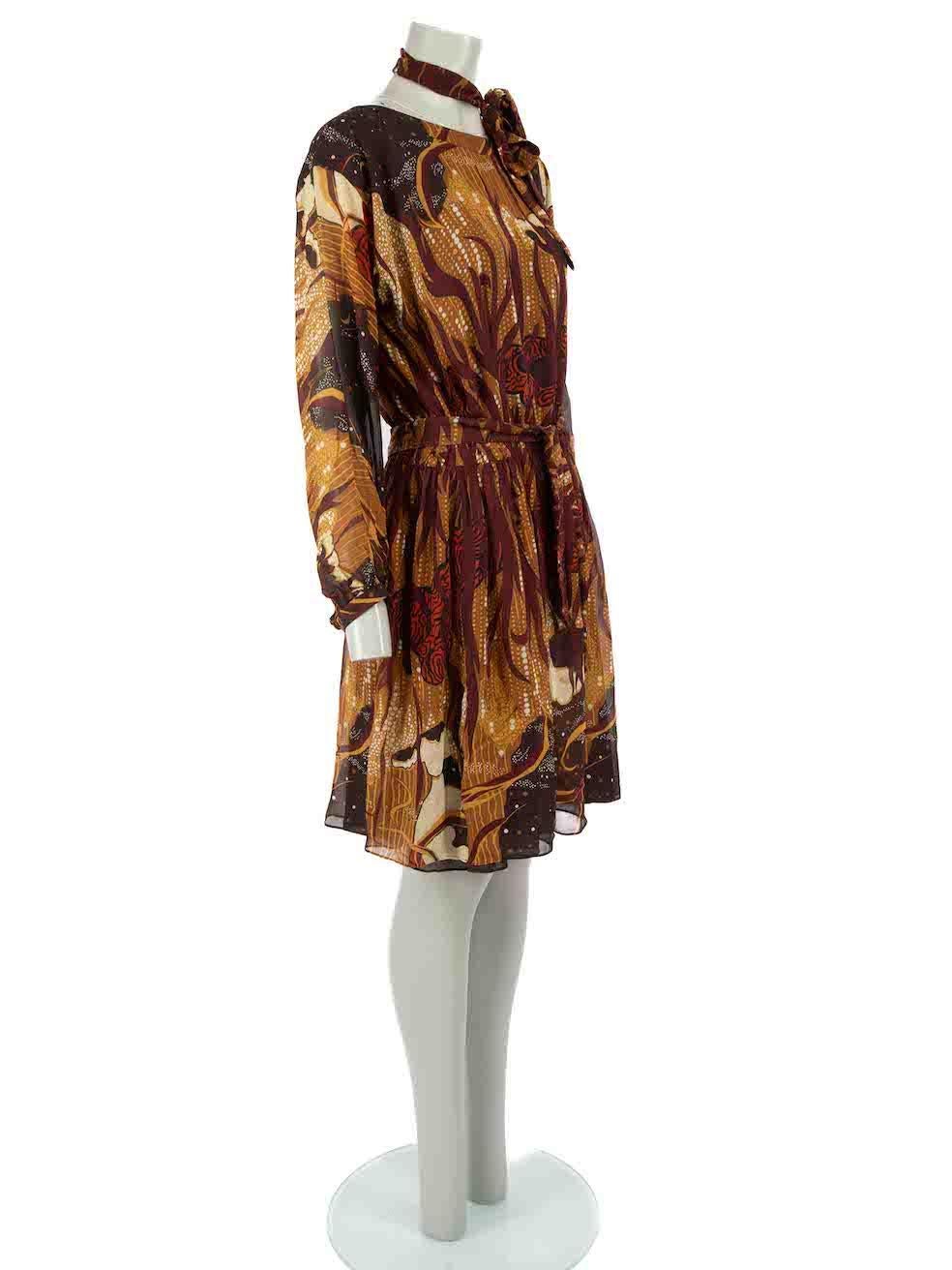 CONDITION is Very good. Minimal wear to dress is evident. Minimal wear to the front and back with light marks to the silk and the button at the right cuff has been replaced on this used Gucci designer resale item.
 
 Details
 Brown
 Silk
 Dress
