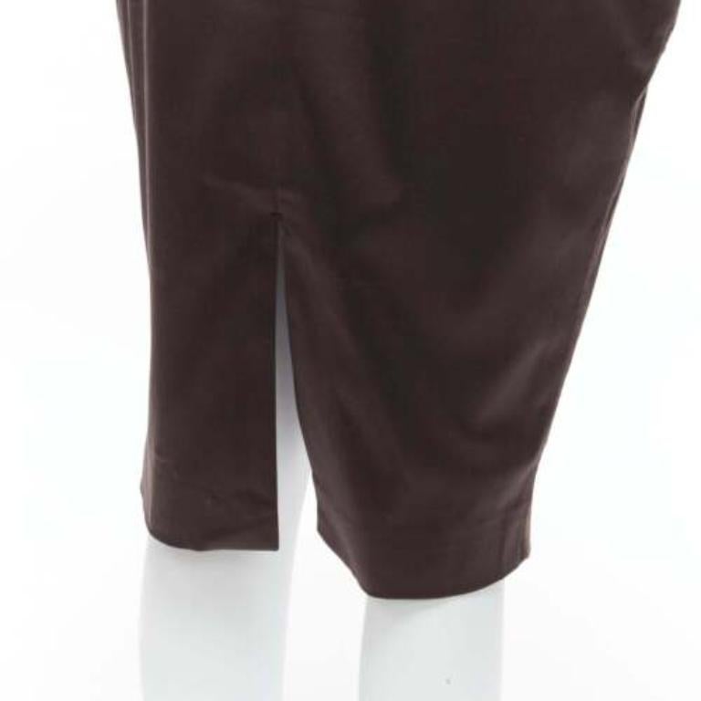 GUCCI brown silky texture zigzag topstitch flap waistband pencil knee skirt IT42
Reference: GIYG/A00351
Brand: Gucci
Material: Feels like cotton
Color: Brown
Pattern: Solid
Closure: Elasticated
Lining: Brown Fabric
Extra Details: Zigzag stitch