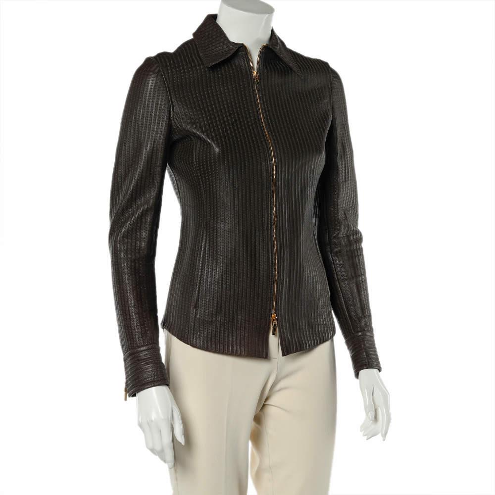 Leather jackets are undoubtedly a staple in one's closet. Gucci brings you this brown jacket beautifully tailored and designed for a classic fit. The women's leather jacket has a stitched surface, long sleeves, front zip closure, and two pockets.

