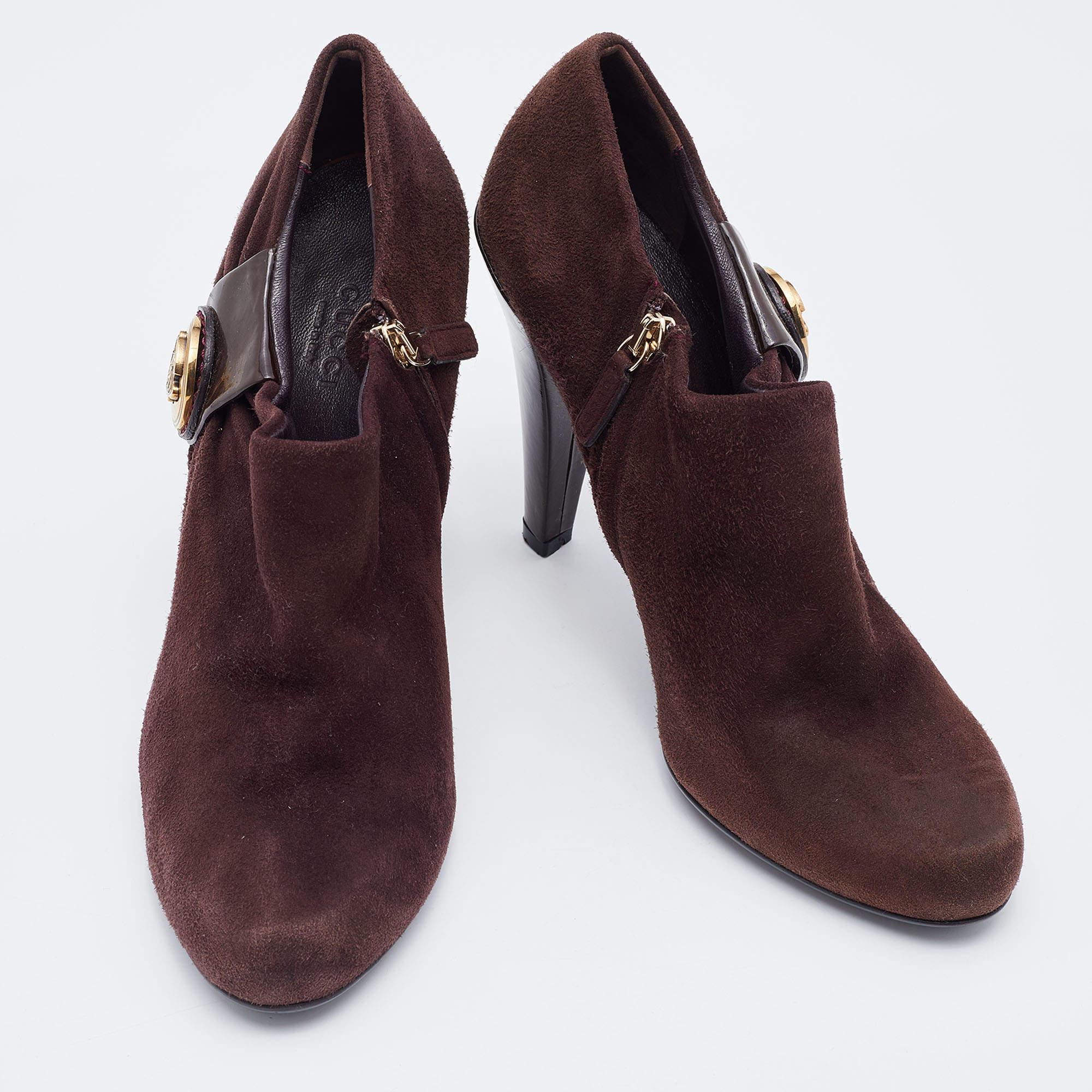 Give your look a classic Gucci finish with these chic brown Hysteria boots. This suede-made pair is accented with a polished gold Hysteria crest, 11cm heels and leather insoles.


