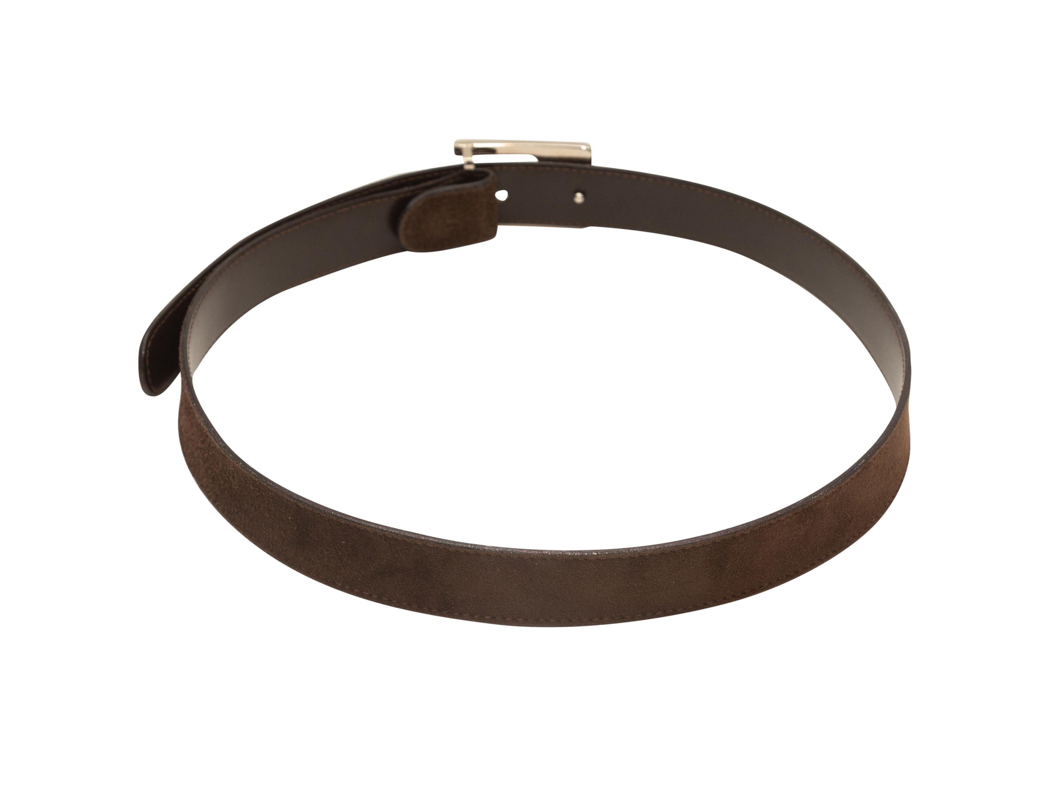 Product details: Vintage brown suede belt by Gucci. Silver-tone G buckle closure at front. 1.5