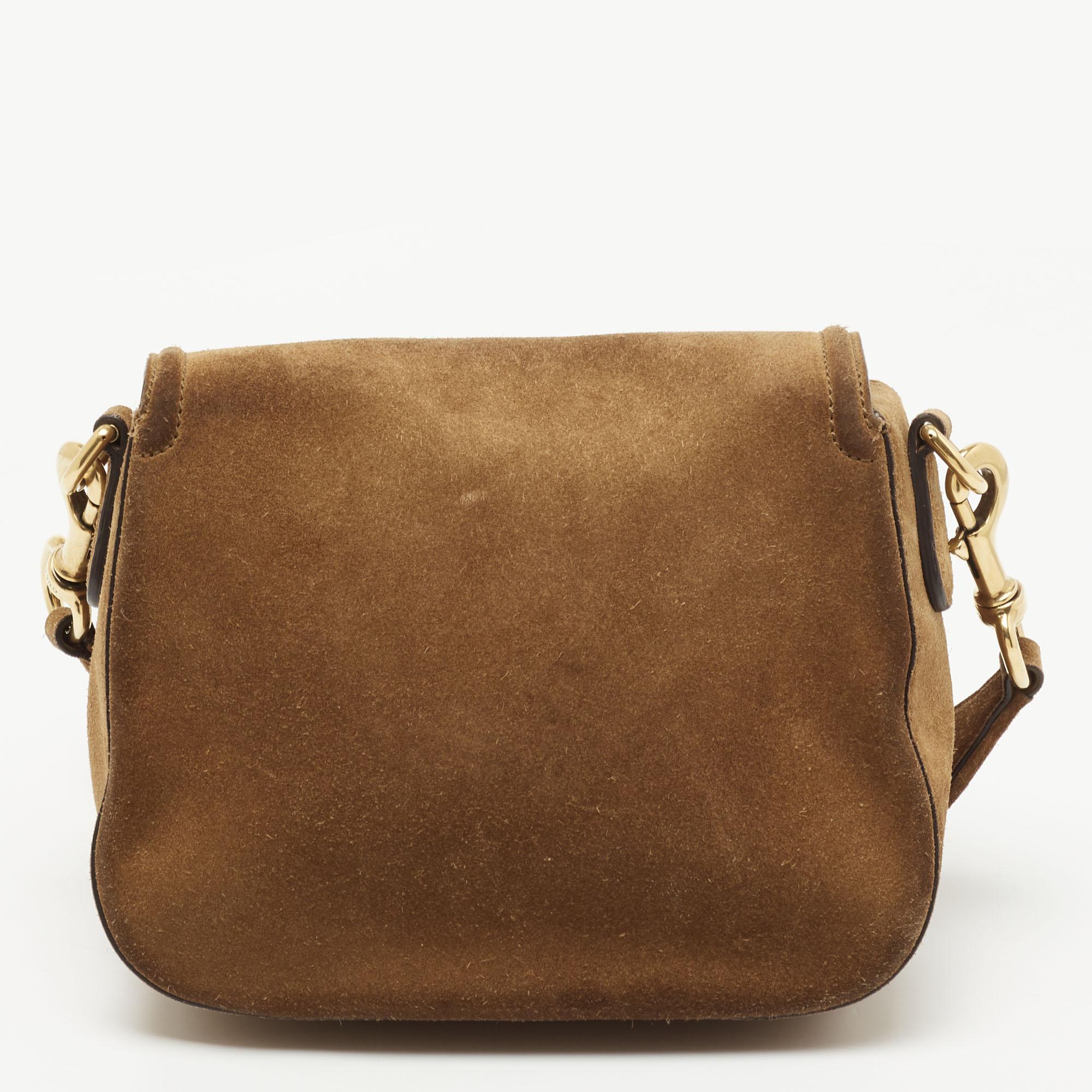 For a look that is complete with style, taste and a touch of luxe, this shoulder bag is the perfect addition. Flaunt this beauty on your shoulder at any event and revel in the taste of luxury it leaves you with.

Includes: Detachable Strap