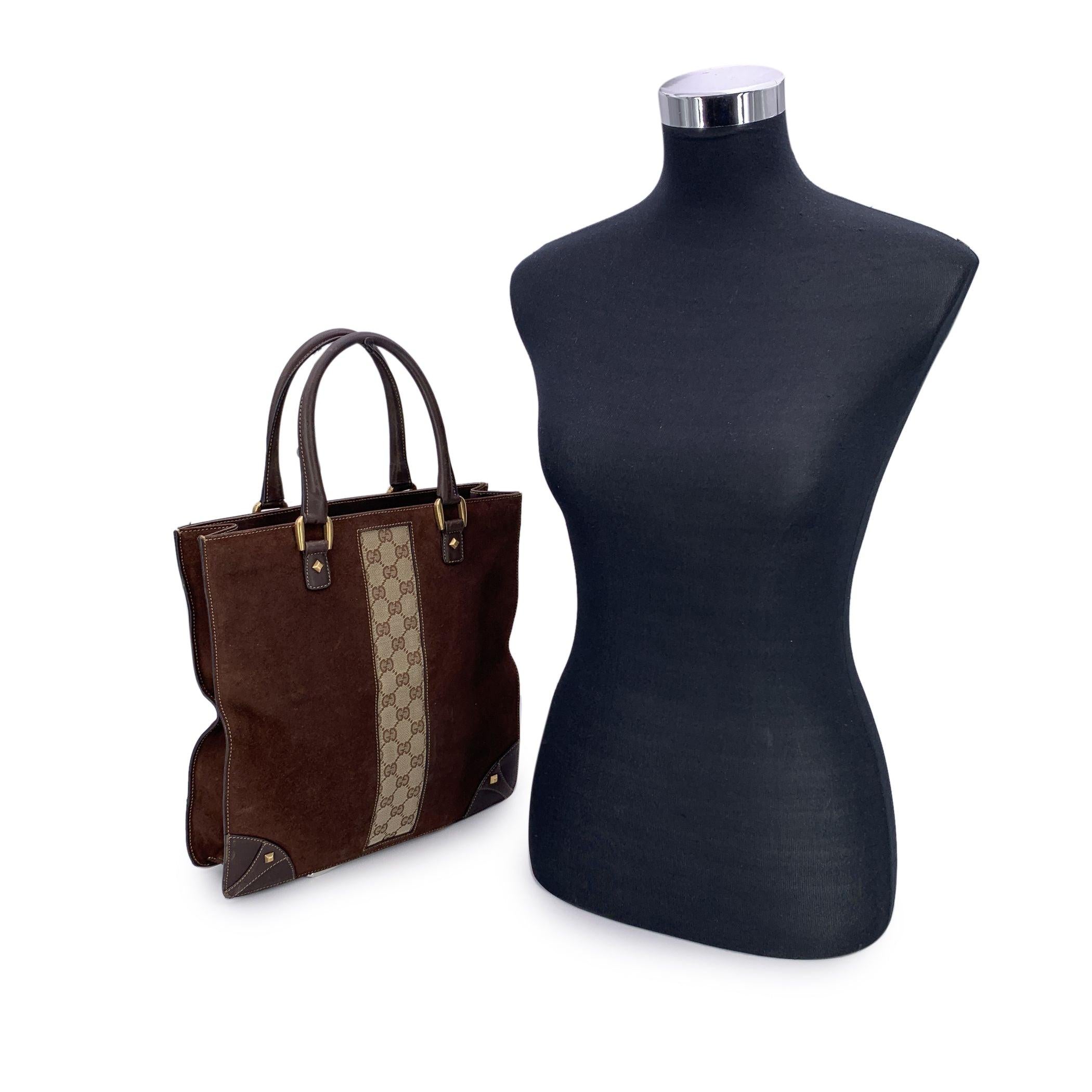 Step back into the understated glamour of vintage Italian design with this beautiful Gucci 'Nailhead' tote-a quietly iconic piece that blends the boldness of the early 2000s with timeless craftsmanship. Rendered in rich brown suede, the bag features