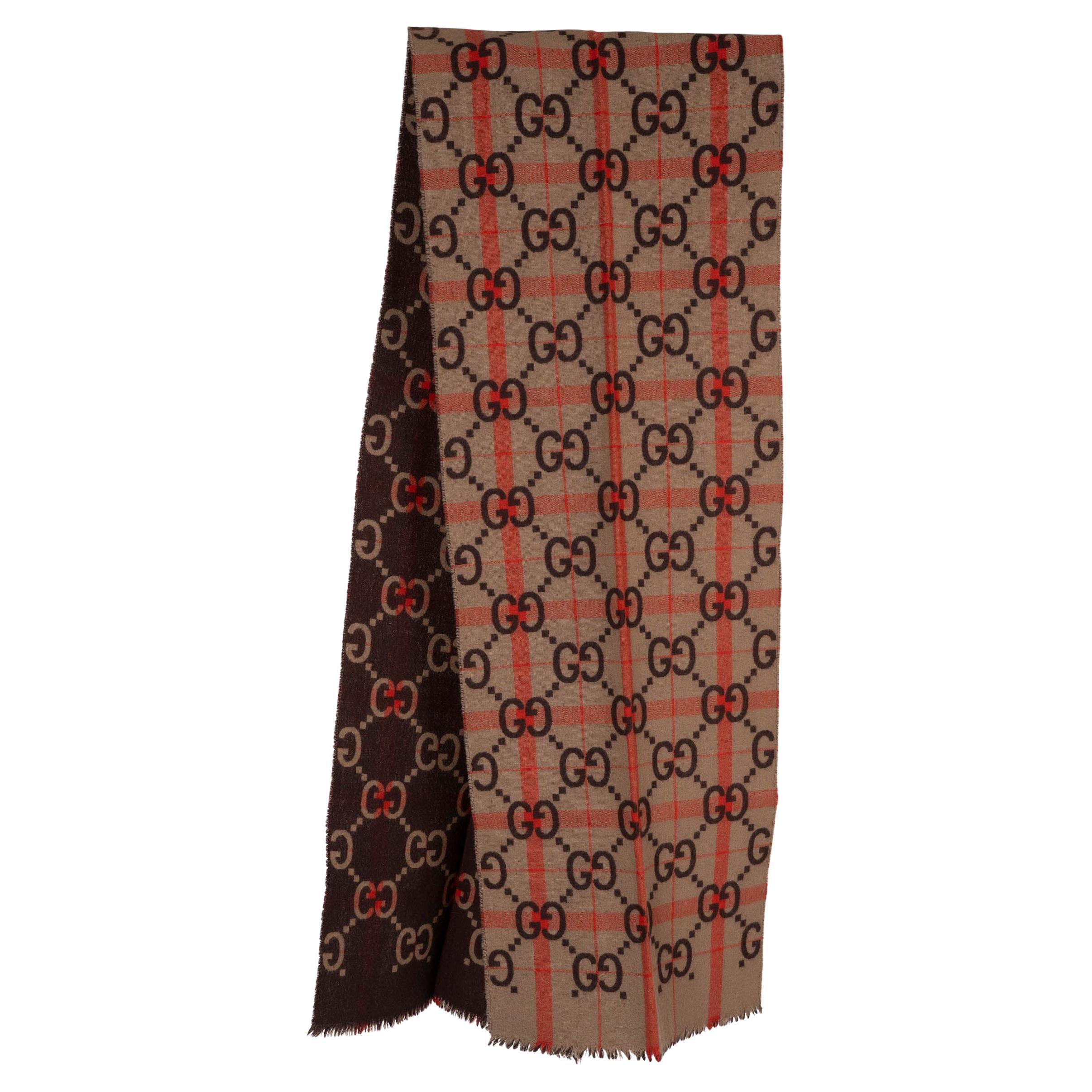 Sciarpa Gucci in lana 2023 GG JACQUARD marrone, arancione e marrone.