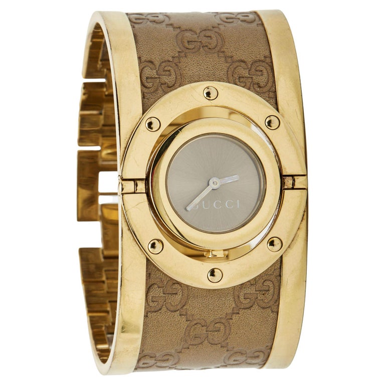 Gucci Brown Two Tone Stainless Steel Leather Twirl YA112434 Women's  Wristwatch 3 at 1stDibs | gucci wrist watch, gucci twirl, gucci two tone  watch