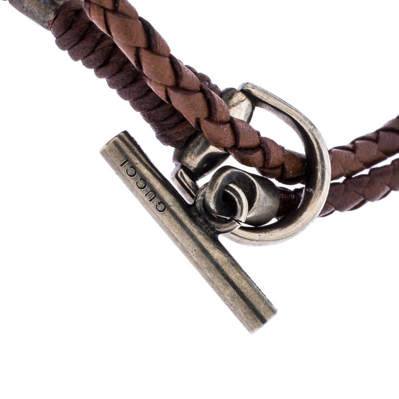 How chic and stylish is this wrap bracelet from Gucci! It is woven from brown leather and features a toggle closure in silver that lends it a distinct appeal. It is designed in a multiple wrap style and is perfect for the fashionable you!

Includes: