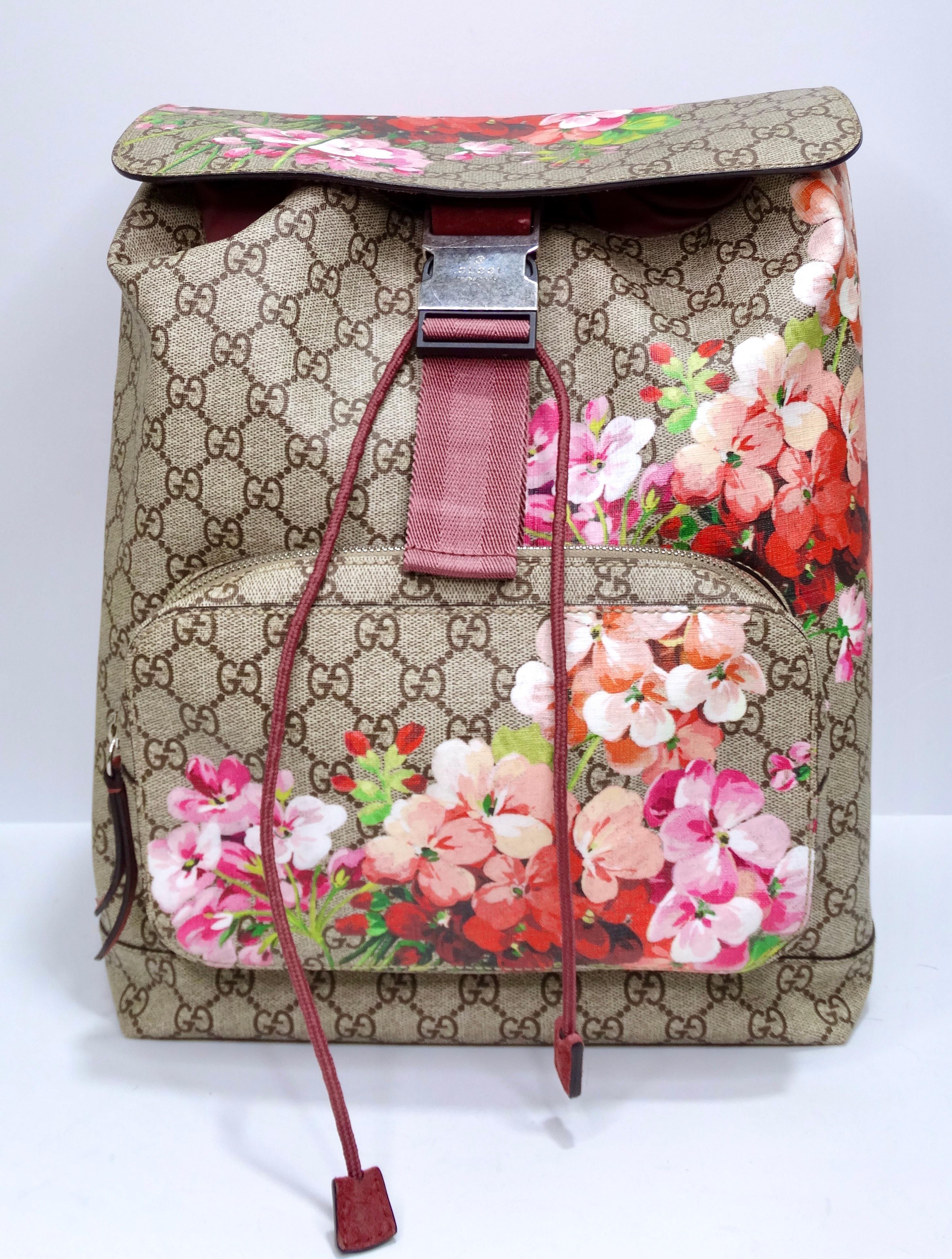 Wherever the day takes you, take on the day with this ultra-cool and unique Gucci backpack! The details are crazy cool as it has a coated canvas brown and beige monogram with a bloom flower pattern that is unique to every bag. A literal piece of