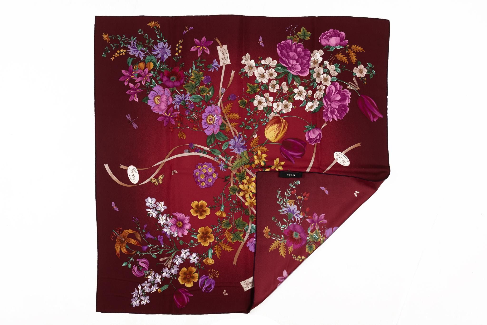 Gucci burgundy silk scarf with multicolor flower design. Hand rolled edges. Excellent condition.