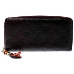 Gucci Burgundy Guccissima Leather Bamboo Tassel Zip Around Wallet