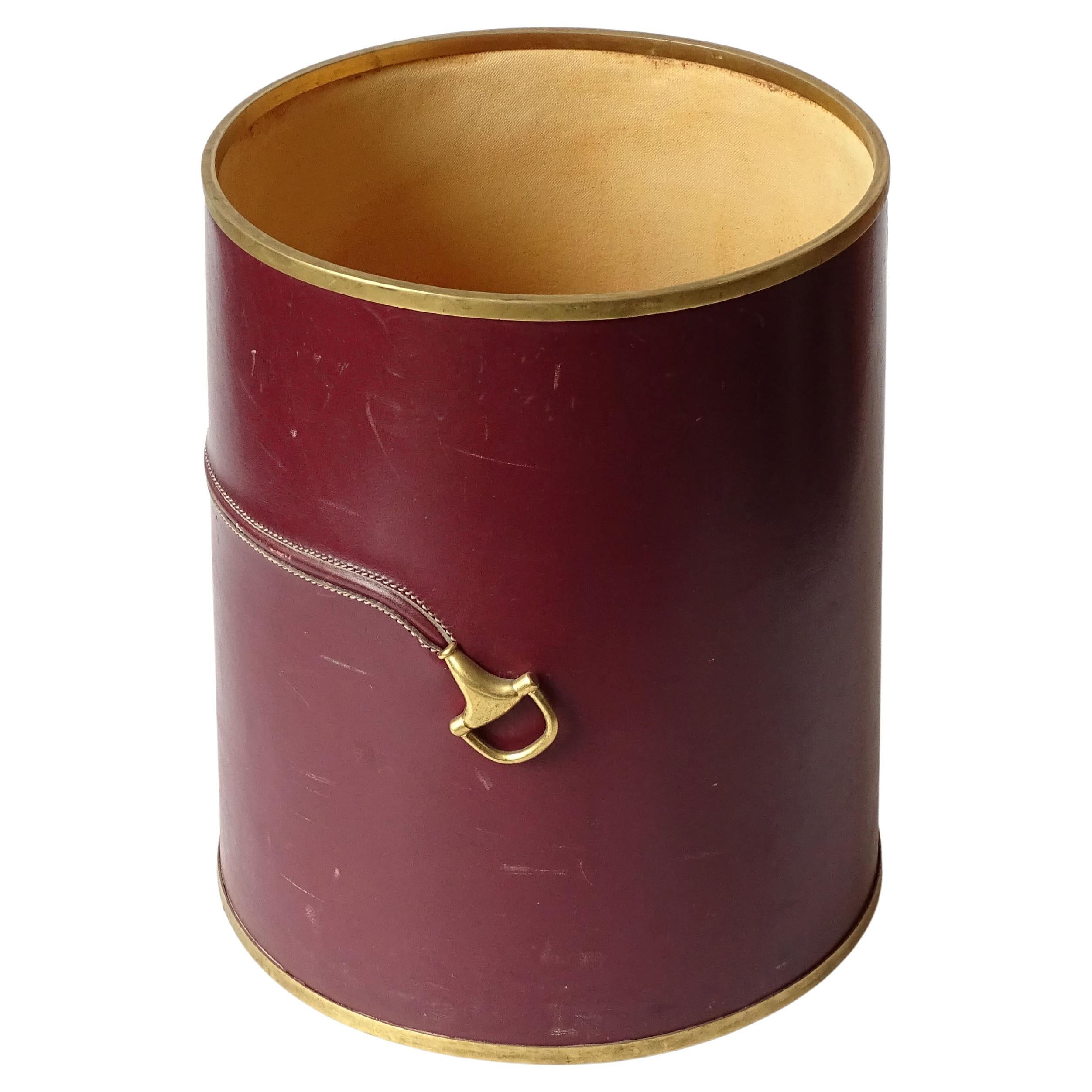 Splendid Gucci Burgundy Leather and Brass Horsebit Waistpaper Basket.
Beautiful craftsmanship and stitching.
Italy 1950s
Fully marked Made in Italy by Gucci 