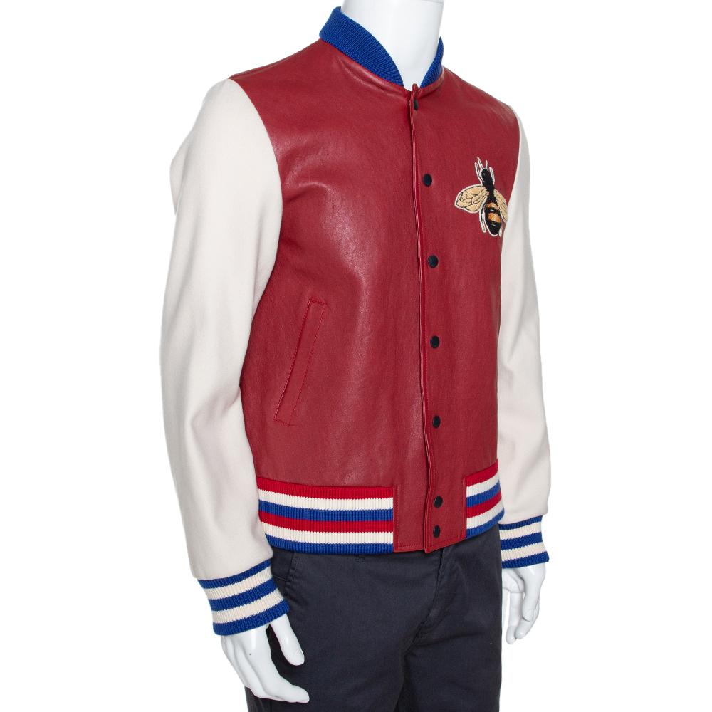 If you have an eye for fun clothing then this jacket by Gucci will surely impress. Adopt a contemporary style with satisfaction through this burgundy creation made from leather. It features front button fastenings, a bee motif at the chest and