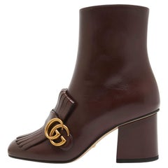 Gucci Burgunderfarbene Lederstiefeletten GG Marmont mit Fransen und Stiefeletten Größe 35.5