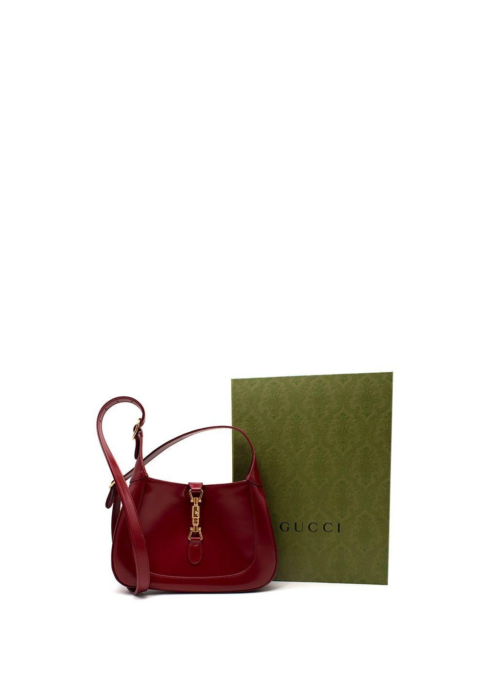Gucci Burgundy Leather Jackie 1961 Bag

- Rerelease of the iconic Jackie bag
- Rich burgundy leather, adorned with a gold-tone metal piston closure, reminiscent of the house horsebit
- Flat leather shoulder strap, with adjustable buckle and add-on