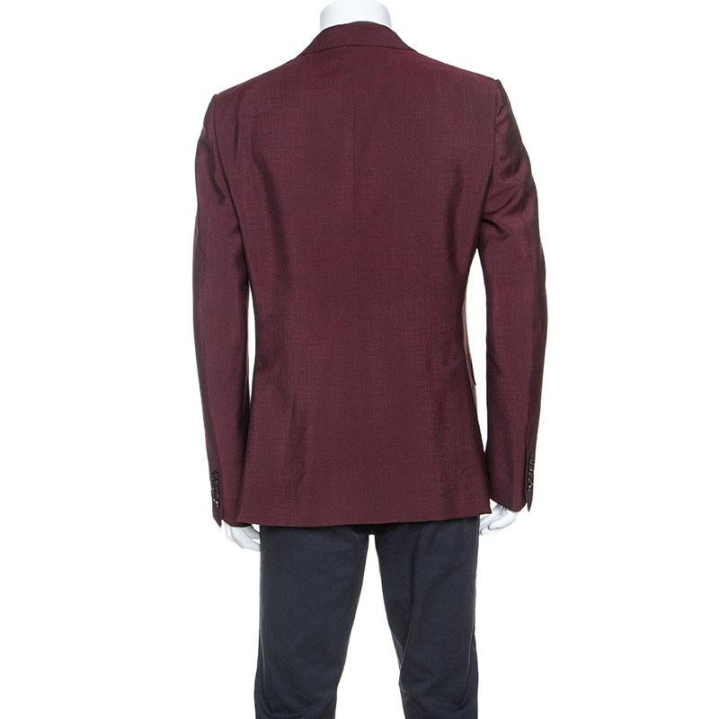 Carry an elegant look every time you get into this Gucci blazer. It is tailored from a mohair and wool blend into a double breasted silhouette. Comfortable and stylish, this blazer is complete with long sleeves, pockets sand notched lapels.