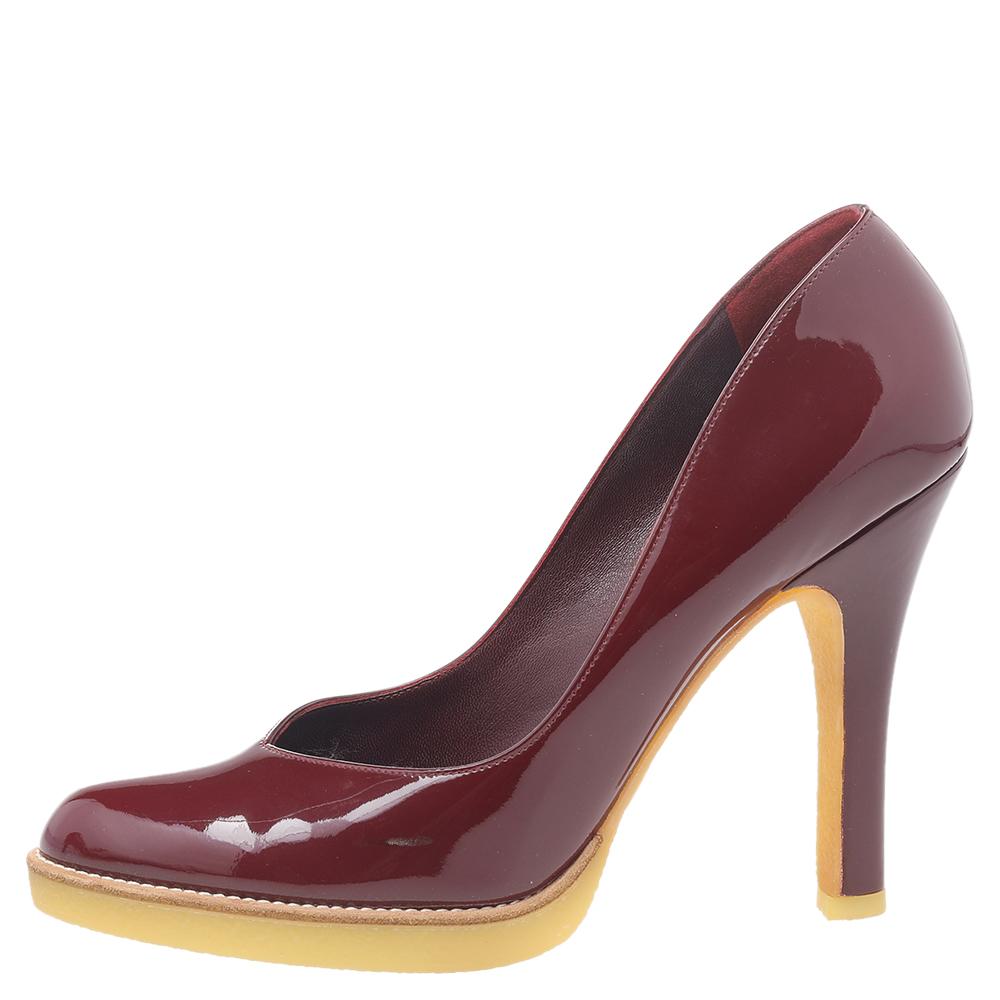 There are some shoes that stand the test of time and fashion cycles, these timeless Gucci pumps are the one. Crafted from patent leather in a burgundy shade, they are designed with sleek cuts, round-toes, and sturdy heels.

Includes: Original Dustbag