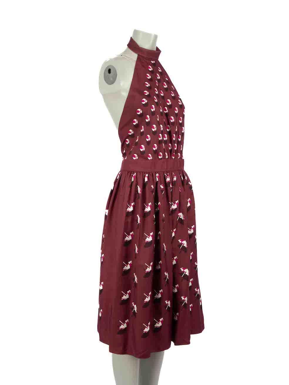 CONDITION is Very good. Minimal wear to dress is evident. Minimal wear to halter neckline where scuff mark is evident on this used Gucci designer resale item.
 
Details
Burgundy
Silk
Dress
Ball and umbrella print
Button halter neck
Open back
Midi
2x