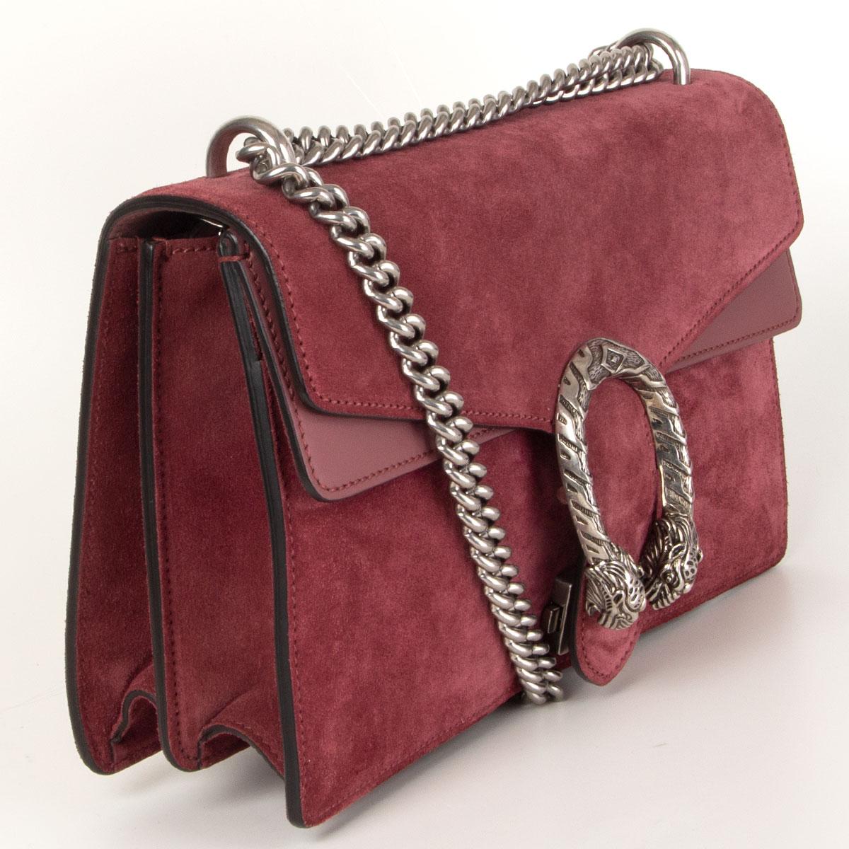 Gucci 'Small Dionysus' shoulder bag in dust burgundy suede and calfskin embellished with a silver-tone tiger's head clasp - it's inspired by the ancient Greek god Dionysus. Opens with push clasp-fastening front flap and is lined in dusty rose
