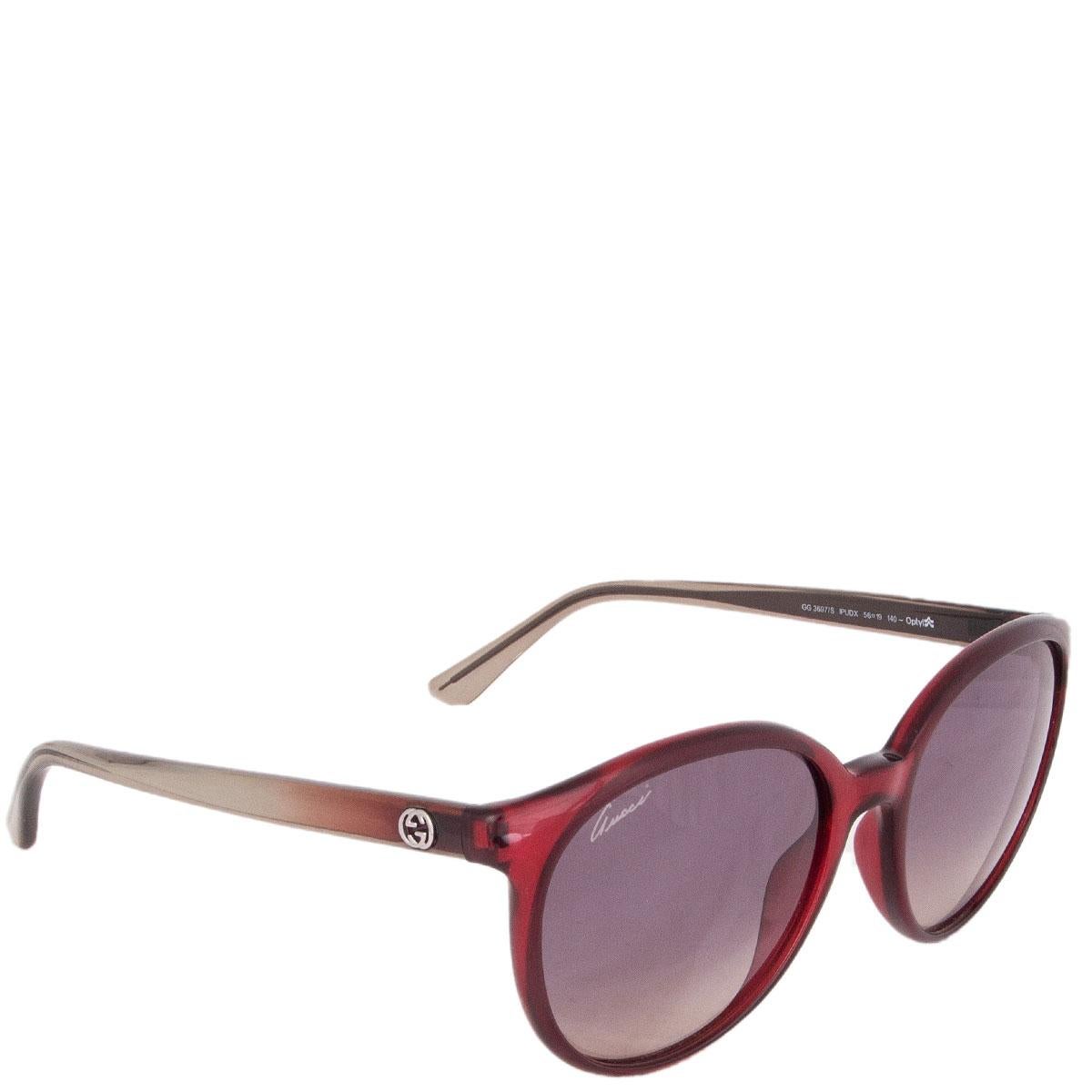 100% authentic Gucci GG 3697/S sunglasses in transparent burgundy aceate with gradient grey lenses. Have been worn and are in excellent condition. No case.

Model	GG 3697/S IPUDX 56-19 140
Width	14.5cm (5.7in)
Height	5.5cm (2.1in)

All our listings