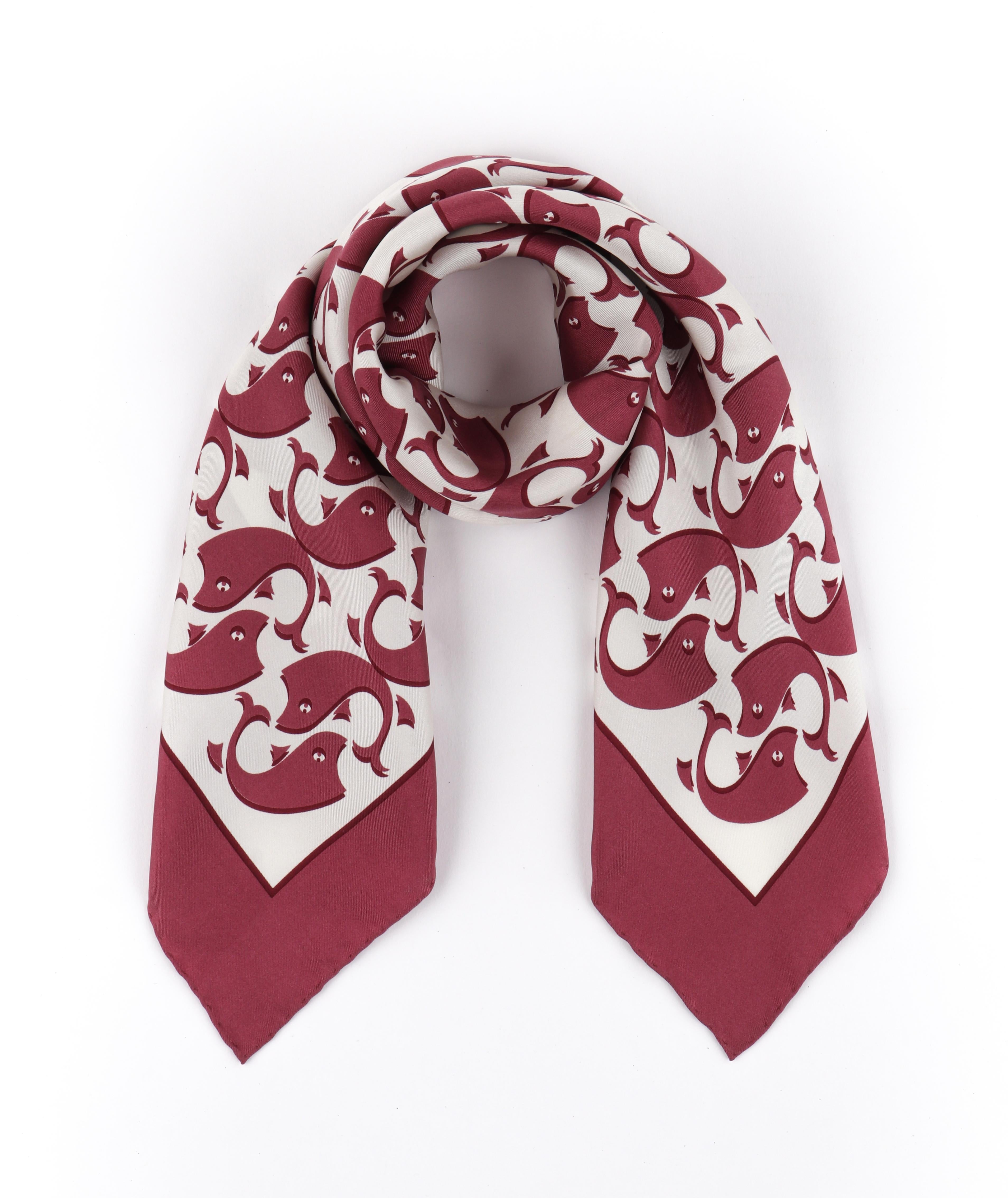 GUCCI Burgundy White Interlocking Whale Pattern GG Logo Square Silk Scarf
 
Brand / Manufacturer: Gucci 
Style: Square Scarf 
Color(s): Shades of Burgundy and White 
Lined: No 
Unmarked Fabric Content (feel of): 100% Silk Twill 
Additional Details /