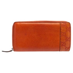 Gucci Gebrannte Orange Microguccissima Leder Zip um Continental Brieftasche