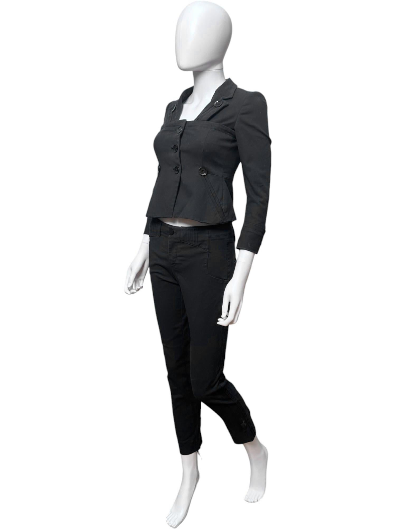 - Designed by Frida Giannini
- Fall Winter 2007
- Multi Button Layered Suit
- Frontal button closure
- Layered design
- High waist pants
- Slim Fit
- Very good condition
- Made in Italy
- Materials: Cotton
- Size: FR 34 - IT 38 - UK 6 - US
