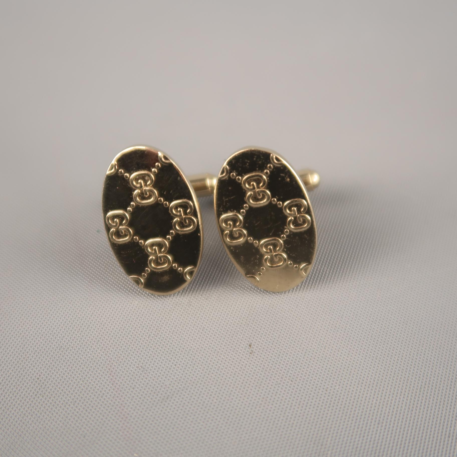 GUCCI by TOM FORD Spring Summer 2000 cuff links come in light gold tone metal with an oval 