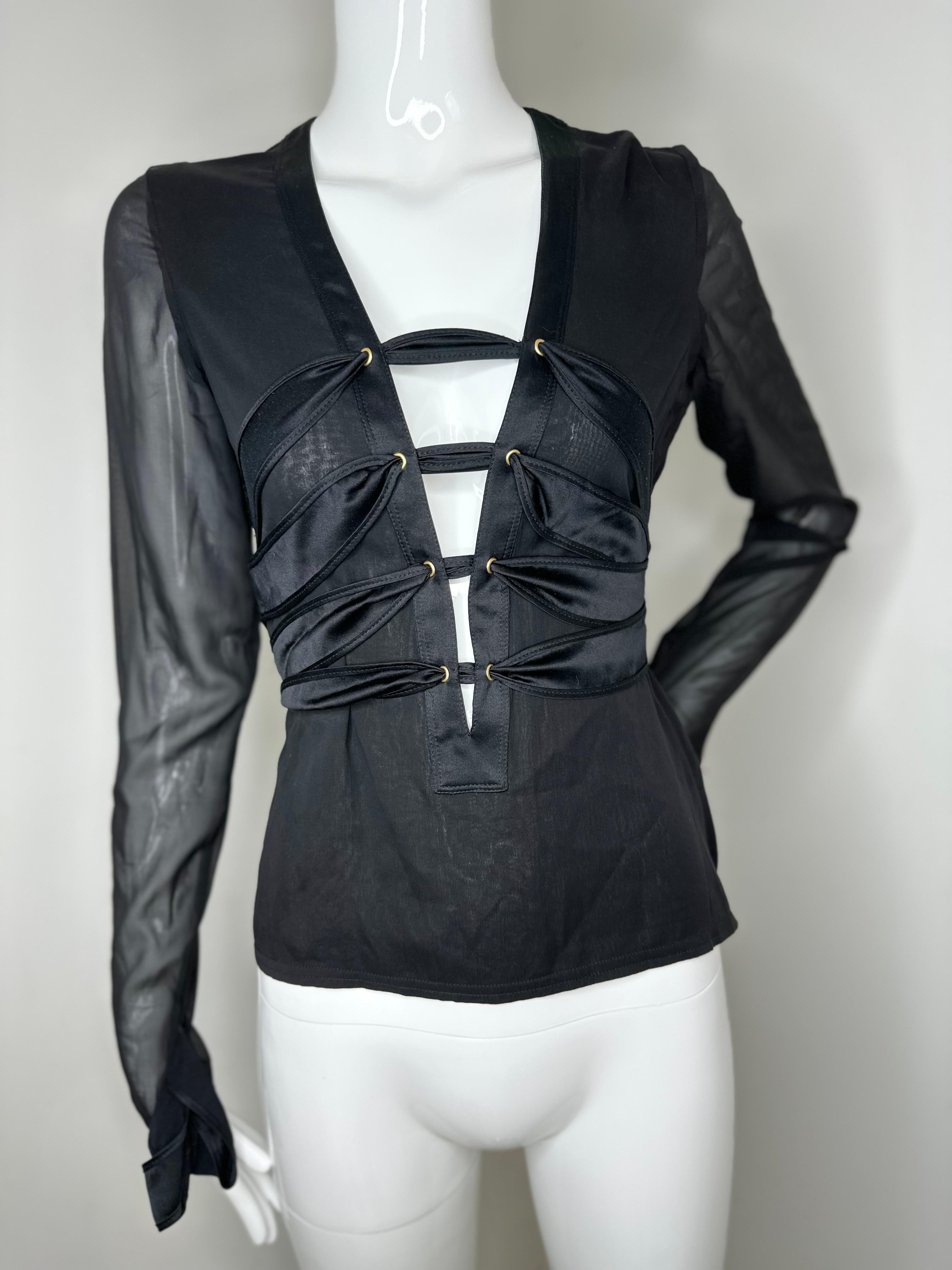 Gucci by Tom Ford 2003 black bondage blouse 
Size 42 fits like S
Size zipper 
Good vintage condition with normal wear throughout