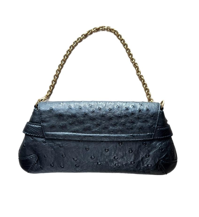 Can Only Ship To USA b/c of Exotic Skin

Tom Ford for Gucci
FW03
Runway
Vintage
Black Ostrich Skin with Muted / Matte Yellow Gold Hardware
Excellent condition, no flaws or signs of wear at all

Measurements in inches laying flat: length along bottom