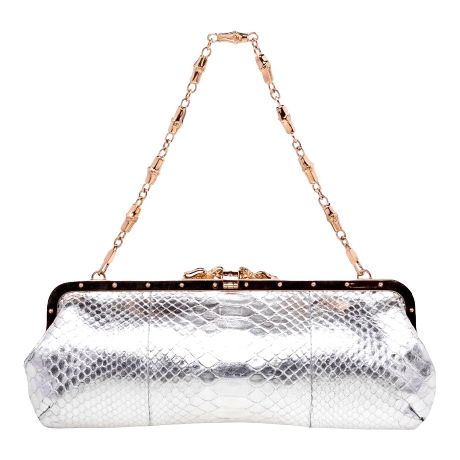 EXTREMELY RARE

GUCCI BY TOM FORD

UNIQUE EVENING BAG WITH GORGEOUS JEWELED DRAGON DETAIL

LIMITED EDITON - ONLY VERY FEW PIECES WERE PRODUCED OF THIS FABULOUS BAG AND SOLD TO A SELECTED CLIENTELE IN GUCCI FLAGSHIP STORES

A KEY PIECE OF TOM FORD'S