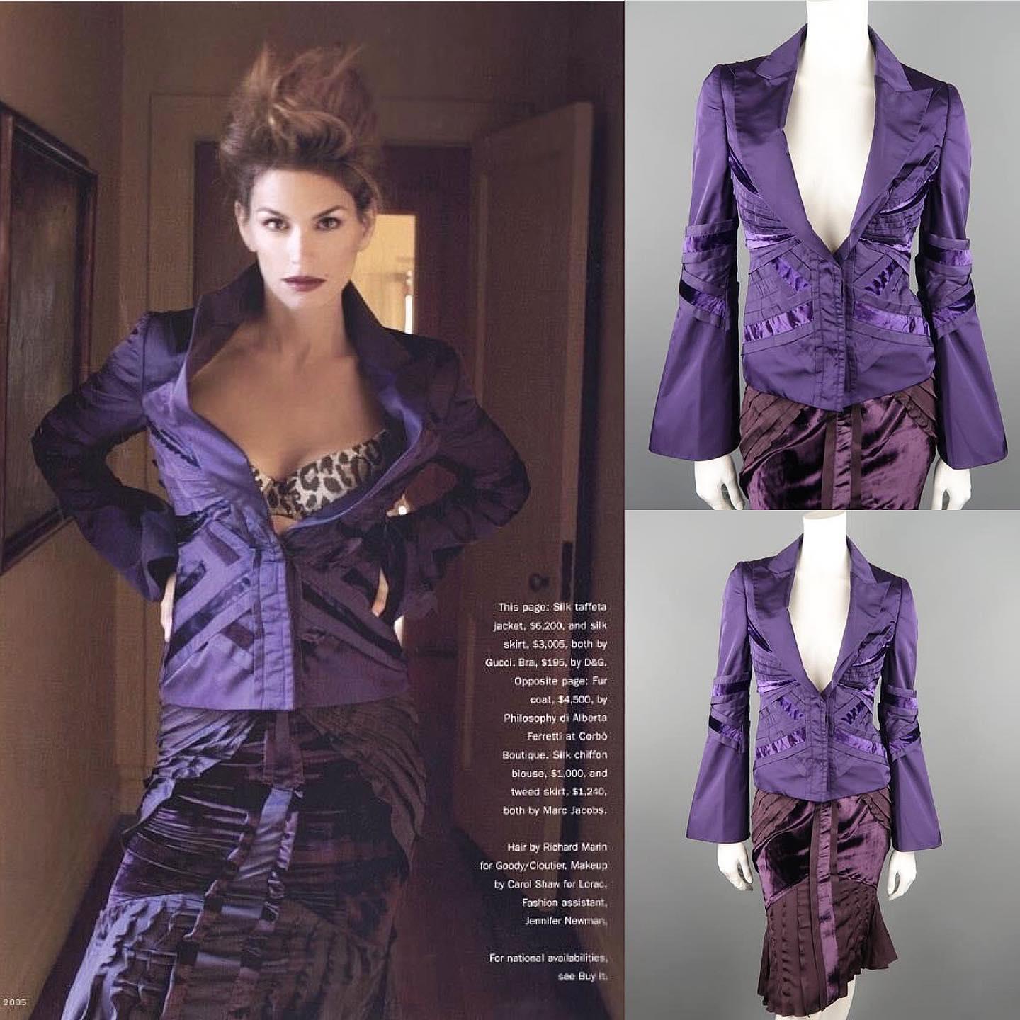 This gorgeous skirt suit from GUCCI Fall 2004, TOM FORD's final collection comes in silk taffeta and includes a purple jacket with a peak lapel, two button single breasted closure with hidden placket, bell sleeves, and all over pleating and velvet